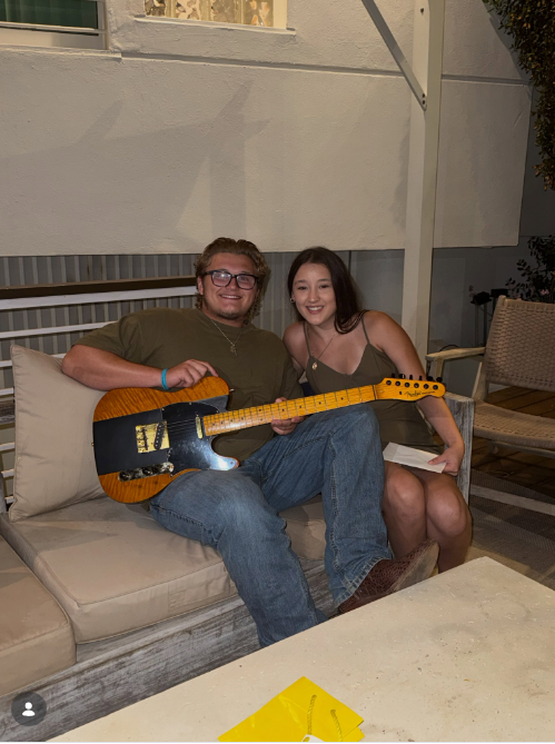 Zuma Rossdale happily posed with his girlfriend Theran Rose while showing off the new Fender Telecaster guitar she gifted him. He shared the special moment to celebrate his new instrument on August 23, 2026. | Source: Instagram/zuma_rossdalemusic