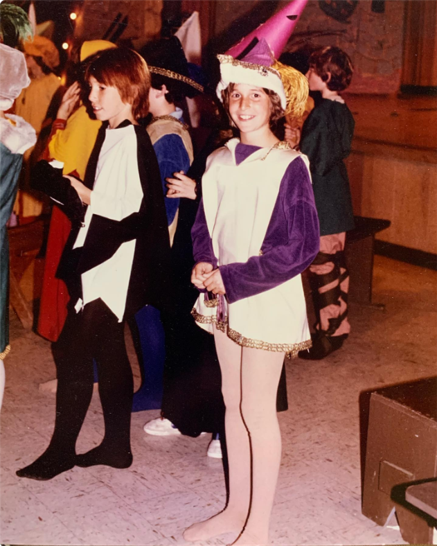 A childhood photo captures the actor smiling in a colorful costume and pointed hat at what appears to be a school event, offering a glimpse into his early years. | Source: Instagram/therealnoahwyle