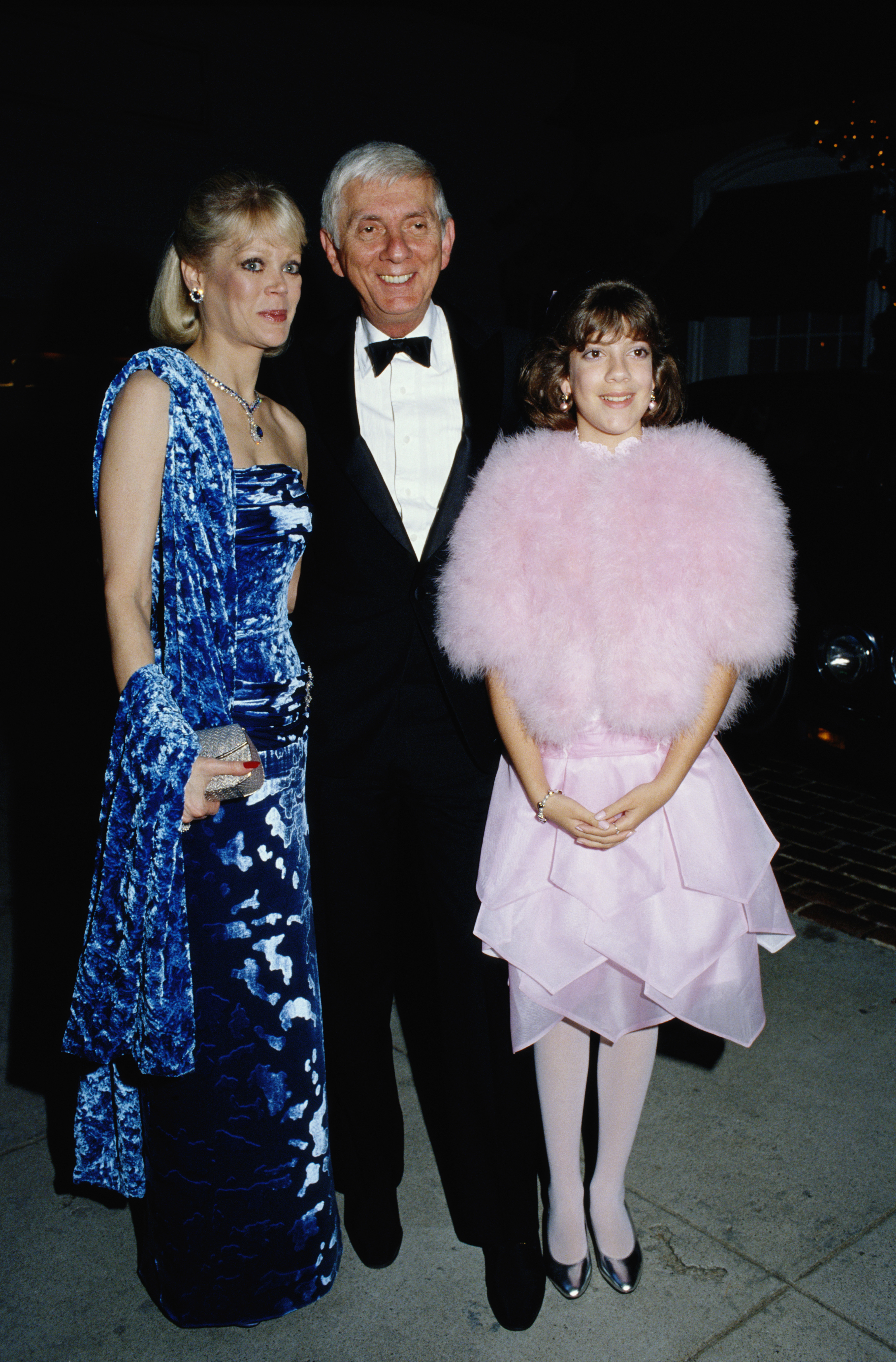 Aaron Spelling, Candy Spelling, and Tori Spelling during the 12th Annual People's Choice Awards at the Santa Monica Civic Auditorium on March 11, 1986, in Santa Monica, California | Source: Getty Images
