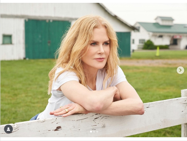 Set against a backdrop of whitewashed barns and a striking green stable door, this view from the fence line blends rural functionality with pastoral calm. From a post dated October 5, 2021. | Source: Instagram/nicolekidman