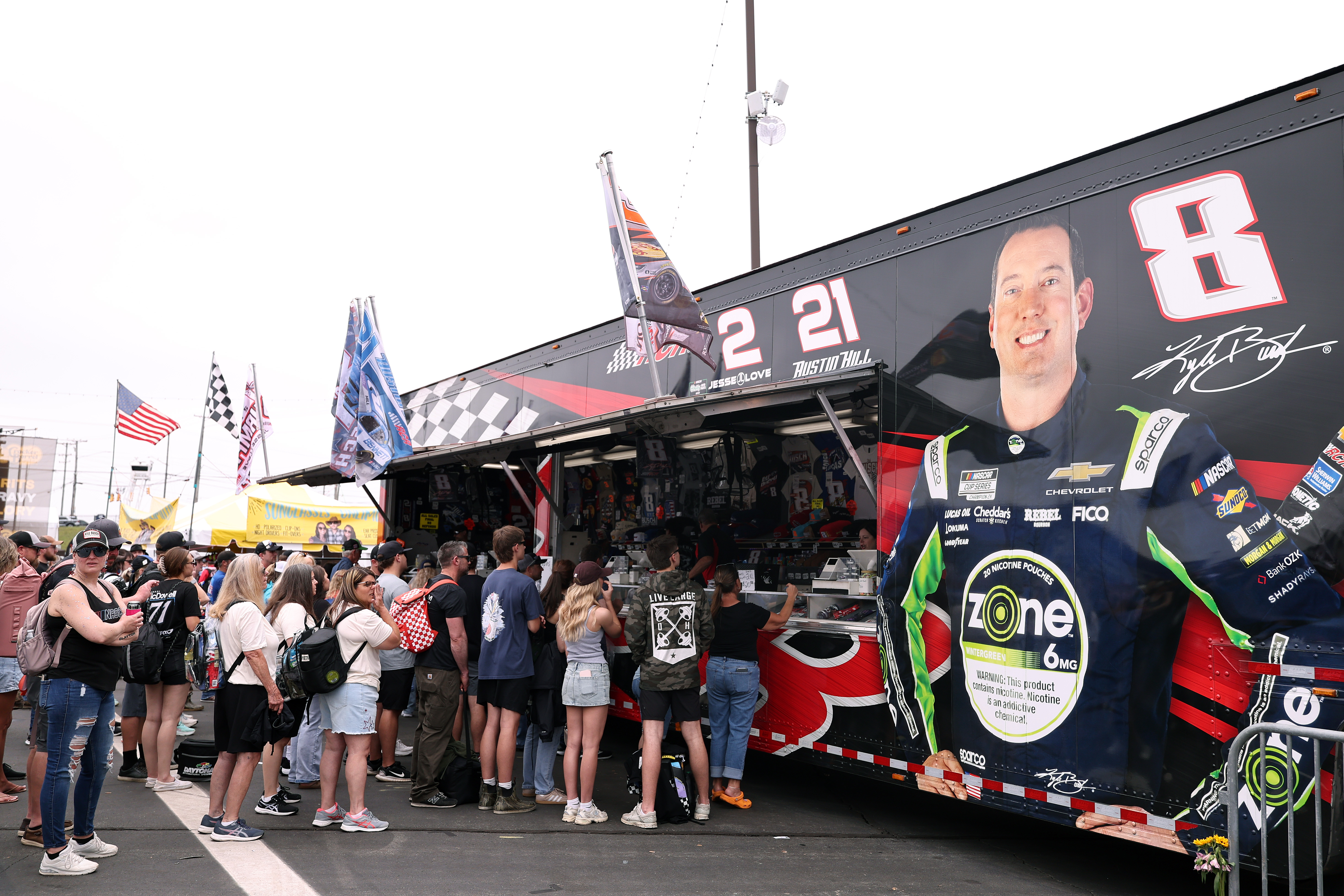 Fans at the Kyle Busch (RCR) merchandise hauler on the midway prior to the NASCAR Cup Series Coca-Cola 600 at Charlotte Motor Speedway on May 24, 2026 in Concord, North Carolina | Source: Getty Images