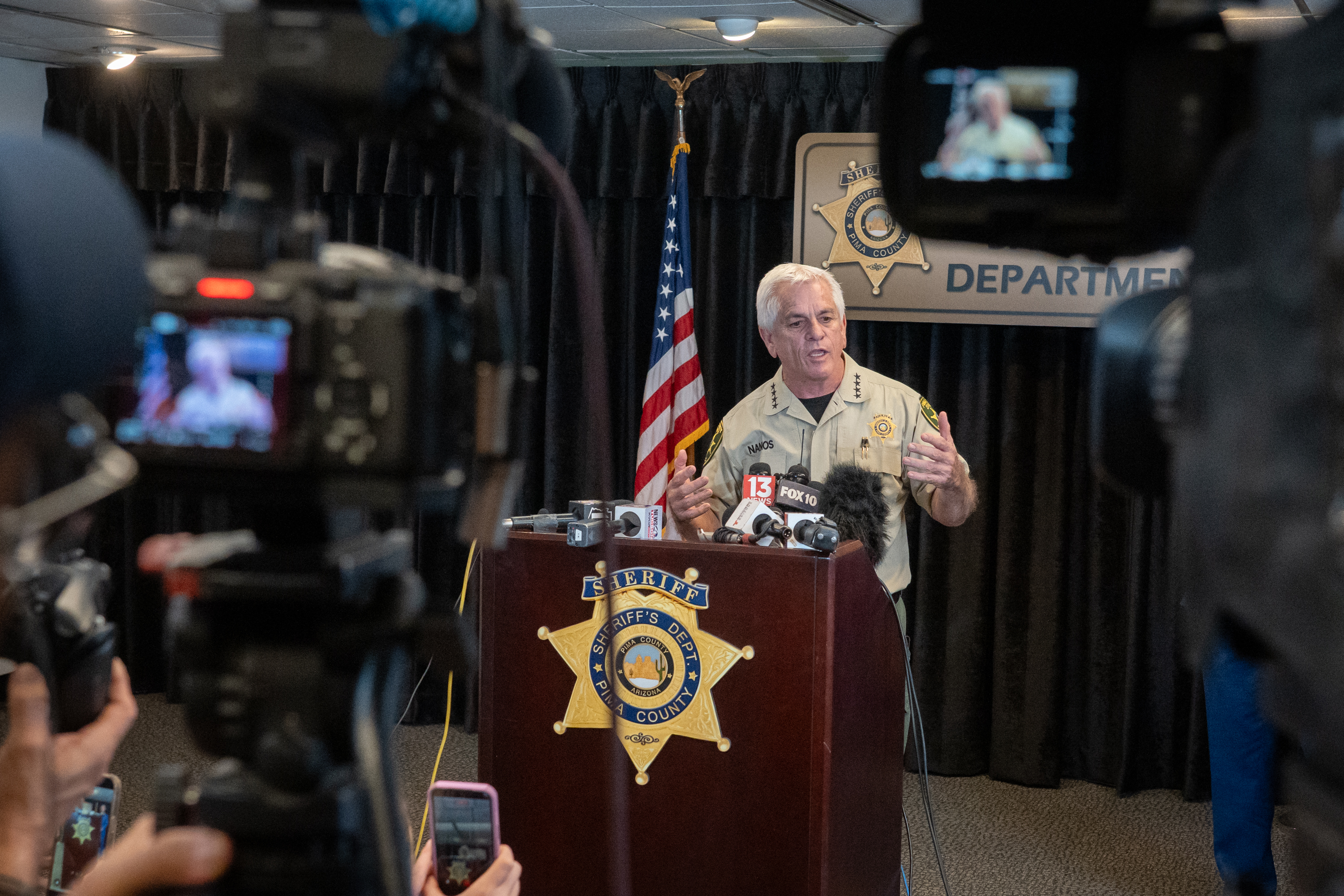 Chris Nanos addresses reporters as investigators provide updates on the disappearance of Nancy Guthrie in Tucson, on February 3, 2026 | Source: Getty Images