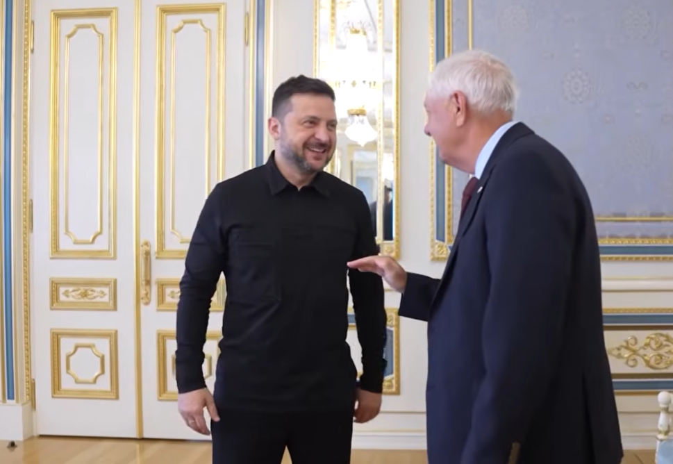 Lindsey Graham leans in to speak with Volodymyr Zelensky during a meeting in Ukraine, capturing a candid moment of discussion as the two leaders exchanged views on the ongoing conflict and U.S. support. | Source: YouTube/APT