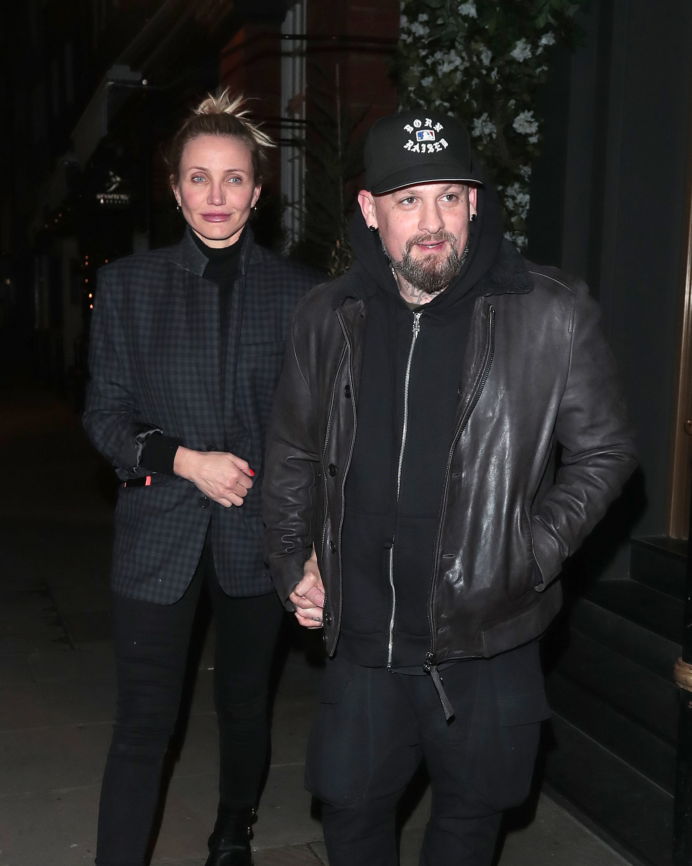 Cameron Diaz and Benji Madden ​seen on a night out on December 2, 2022, in London, England. | Source: Getty Images