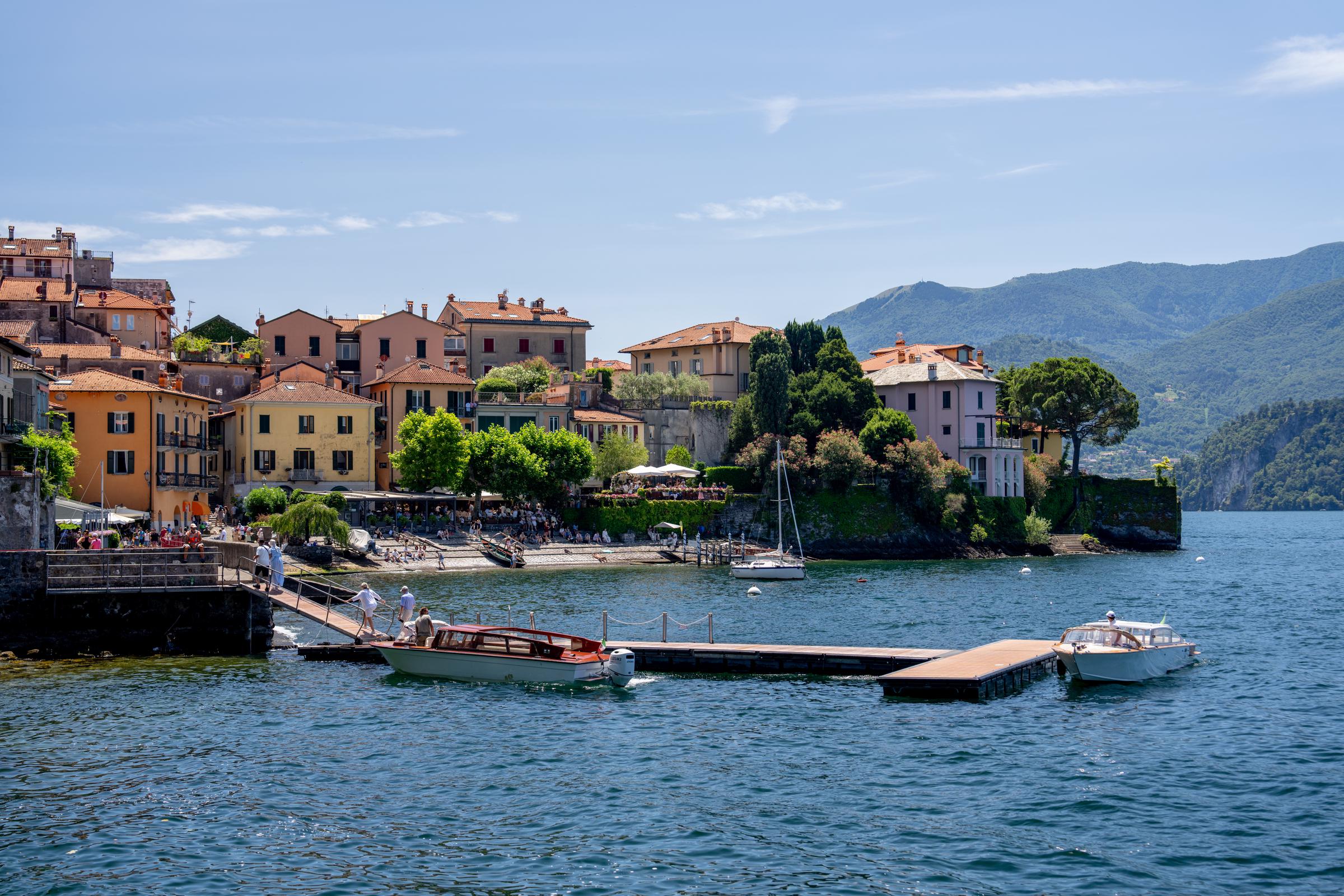 Lake Como has been intertwined with the Clooneys' family life for years, but it also became the setting for their ambitious philanthropic plans. A five-day 2025 experience benefiting the Clooney Foundation for Justice was designed to raise more than $1 million in direct support. | Source: Getty Images