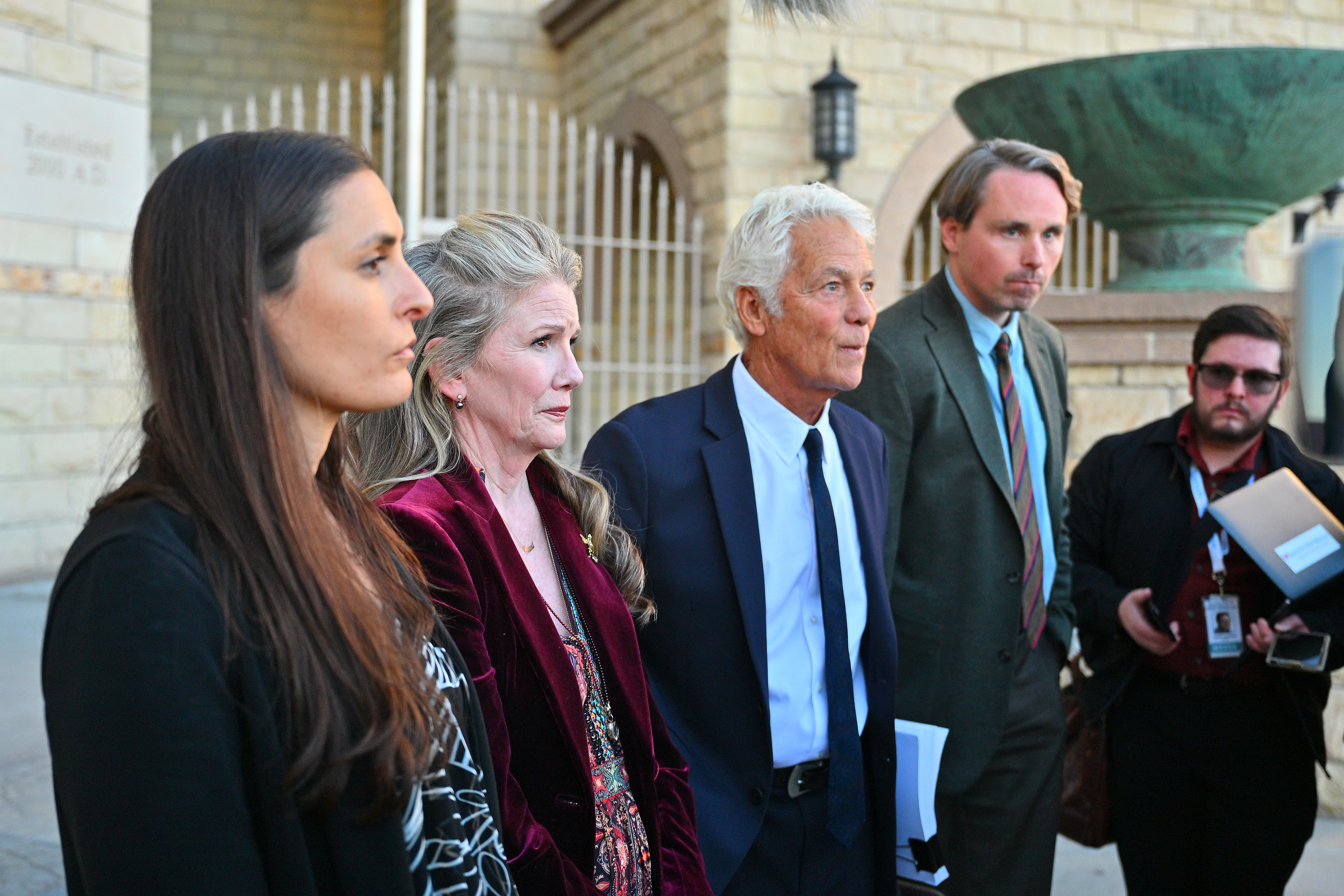 Melissa Gilbert appeared alongside members of her husband's legal team as his case moved through the courts. On January 20, 2026, she joined attorneys Amber Fayerberg, Larry Stein, and Christopher Allen Dodd outside the Bernalillo County Courthouse following Busfield's pretrial release hearing. | Source: Getty Images