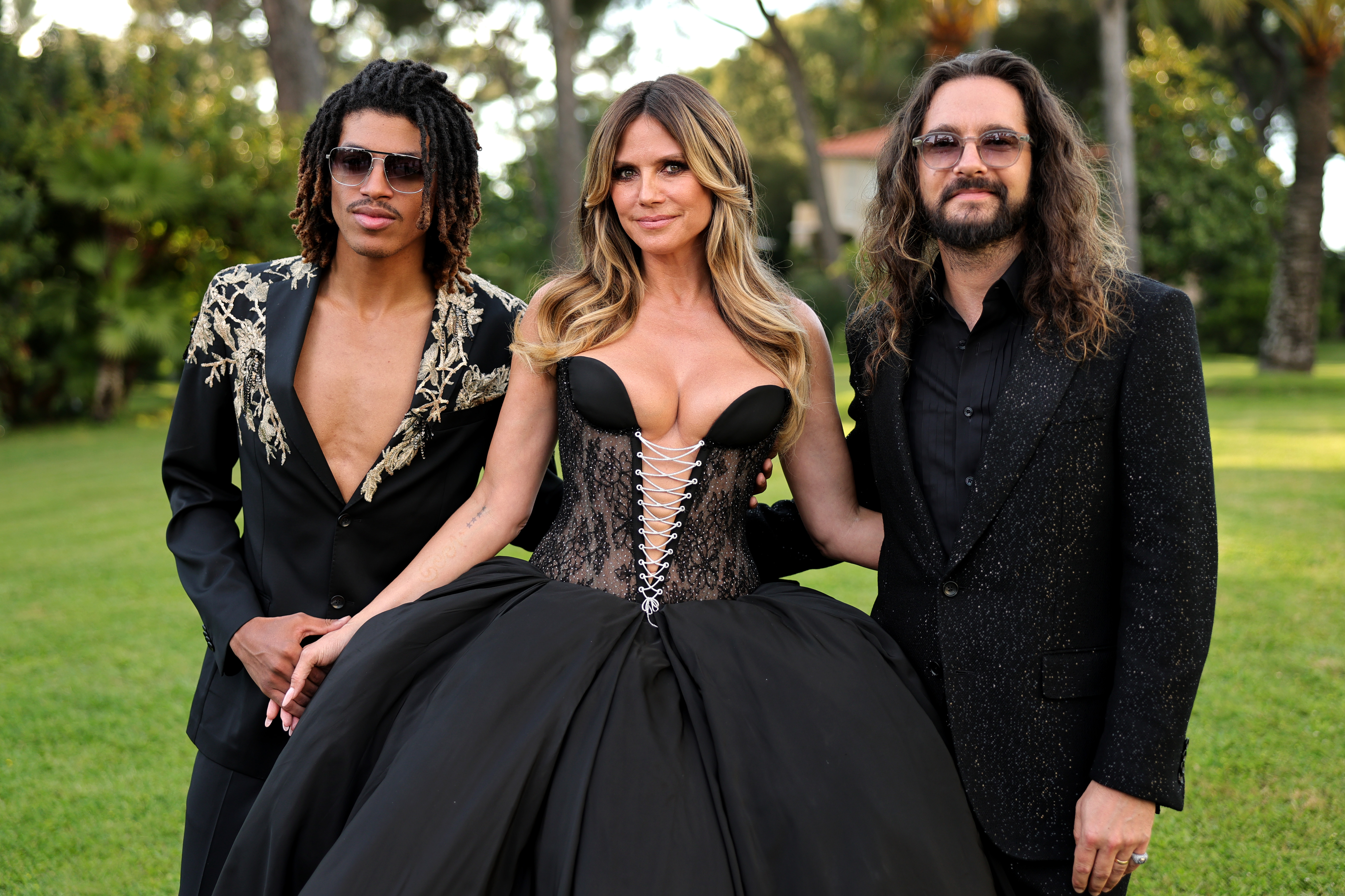 Henry Samuel, Heidi Klum, and Tom Kaulitz attend the amfAR Gala Cannes presented by Chopard at Hotel du Cap-Eden-Roc on May 21, 2026, in Cap d'Antibes, France | Source: Getty Images