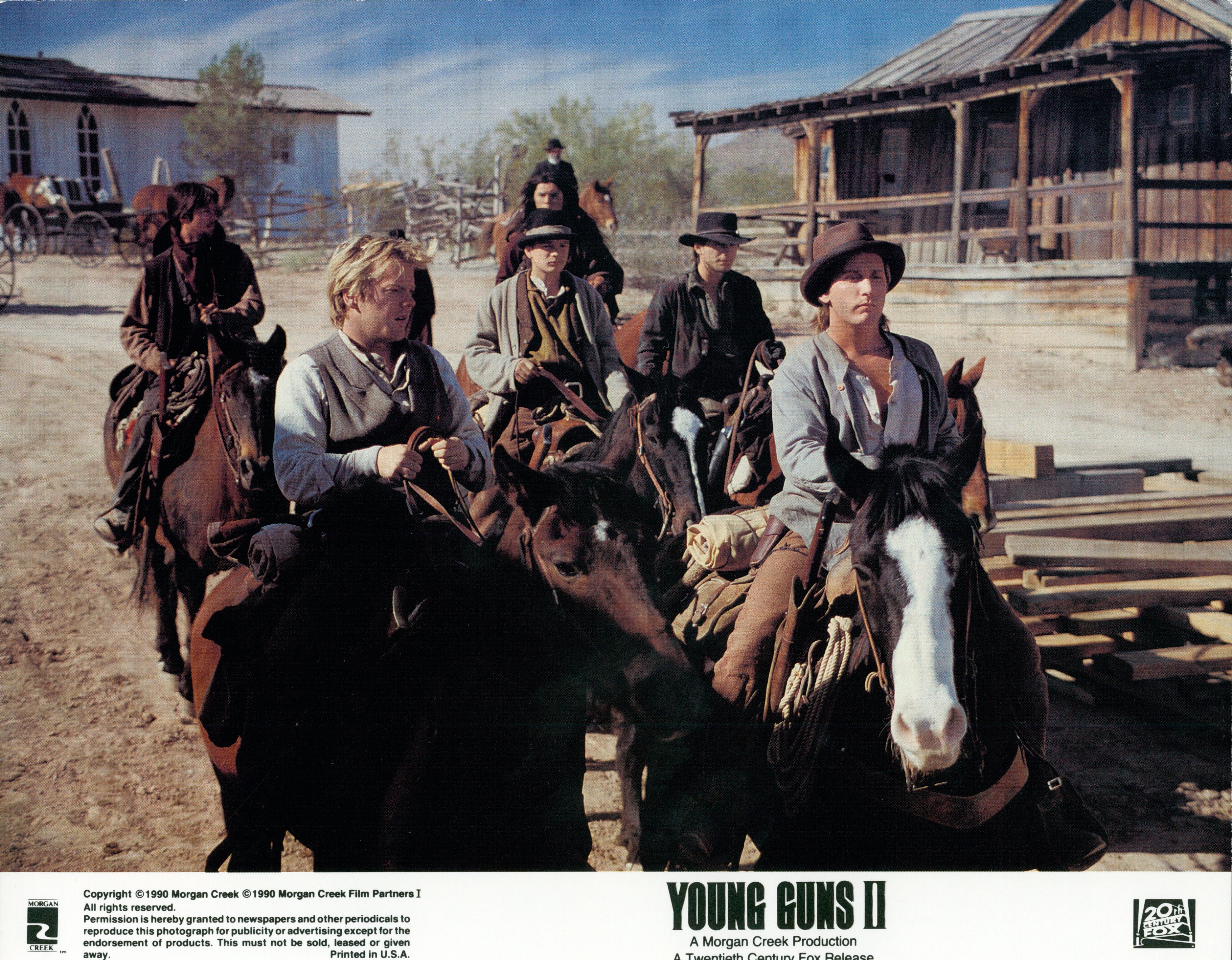 1988: Actors Kiefer Sutherland and Emilio Estevez star in the film Young Guns. | Source: Getty Images