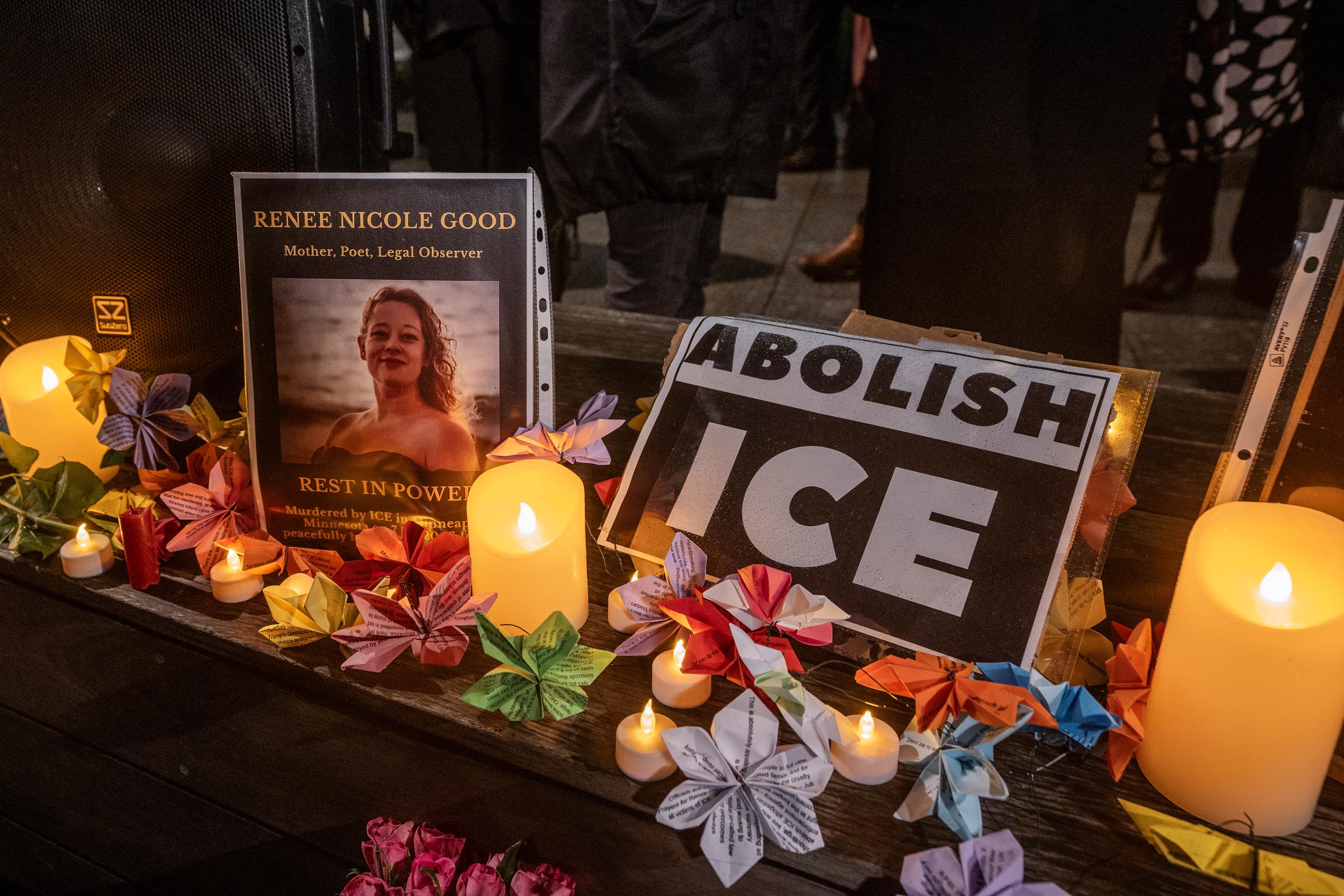 A memorial site filled with photos, signs and candles created in honor of Renee Nicole Good outside the U.S. Embassy in London, England on January 12, 2026. | Source: Getty Images