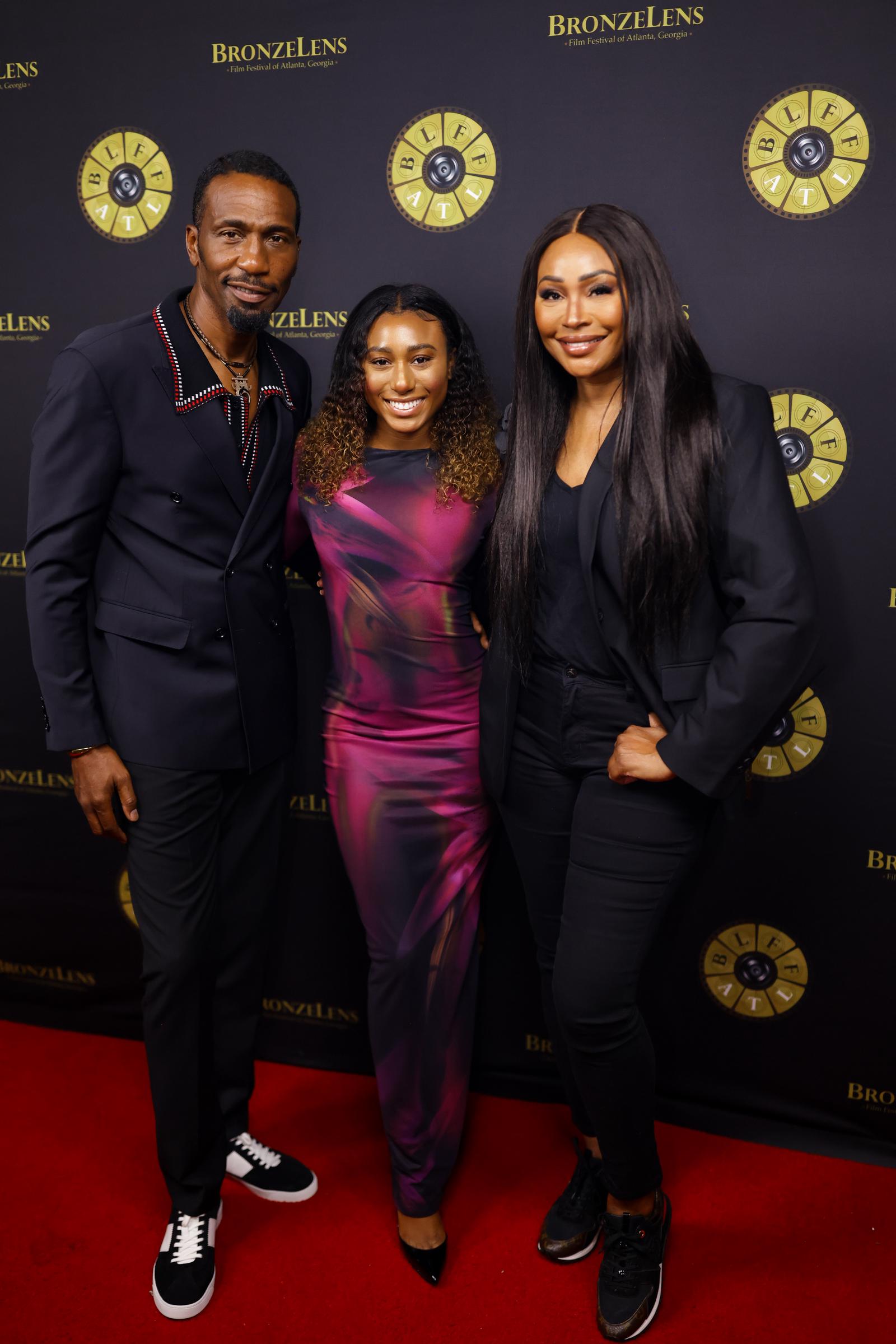 Leon and Noelle Robinson with Cynthia Bailey at "The Rhythm and the Blues" opening night feature during the BronzeLens Film Festival in Atlanta, Georgia on August 20, 2025. | Source: Getty Images