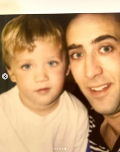 A young Weston Cage Coppola appeared alongside his father, Nicolas Cage, in a childhood photo that offered an early look at their resemblance years before Coppola developed his distinctive heavy-metal image. The close-up showed father and son looking toward the camera, with their similarly striking eyes particularly visible. Coppola revisited moments from his younger years when he shared the throwback as part of an Instagram post dated June 21, 2026. | Source: Instagram/westoncagecoppola