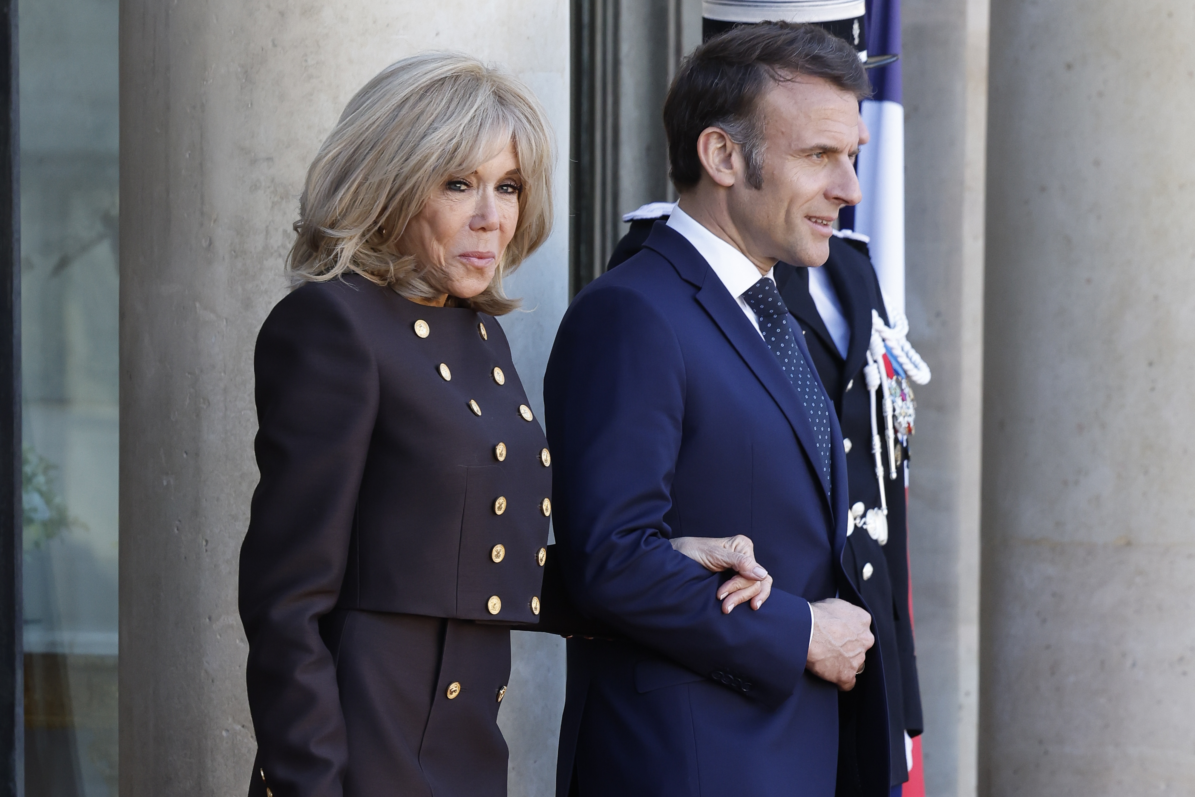 French First Lady Brigitte Macron and French President Emmanuel Macron awaiting to greet the King Frederik X of Denmark and Queen Mary of Denmark outside the Élysée Palace in Paris, France on March 31, 2025. | Source: Getty Images