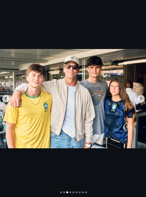 Tom Brady posed with all three of his children, Jack, Benjamin, and Vivian, during their day at the FIFA World Cup final. The family photo highlighted their close bond while also prompting many to point out the similarities in their defined jawlines and facial structure, with several saying the resemblance was impossible to ignore altogether. | Source: Instagram/tombrady