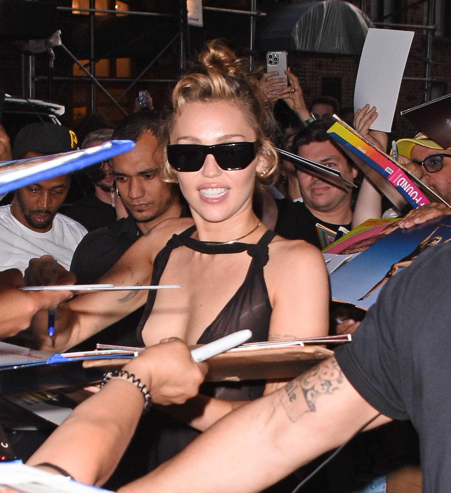 Miley Cyrus seen signing autographs in New York City on June 4, 2025 | Source: Getty Images