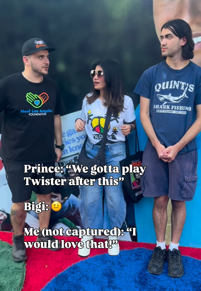 Prince speaks up and says something cheeky as and Bigi were arranging themselves for a photo with Tanaya Amar, who attened the King of Popcorn event on August 28, 2026. | Source: Instagram/tanayaamar