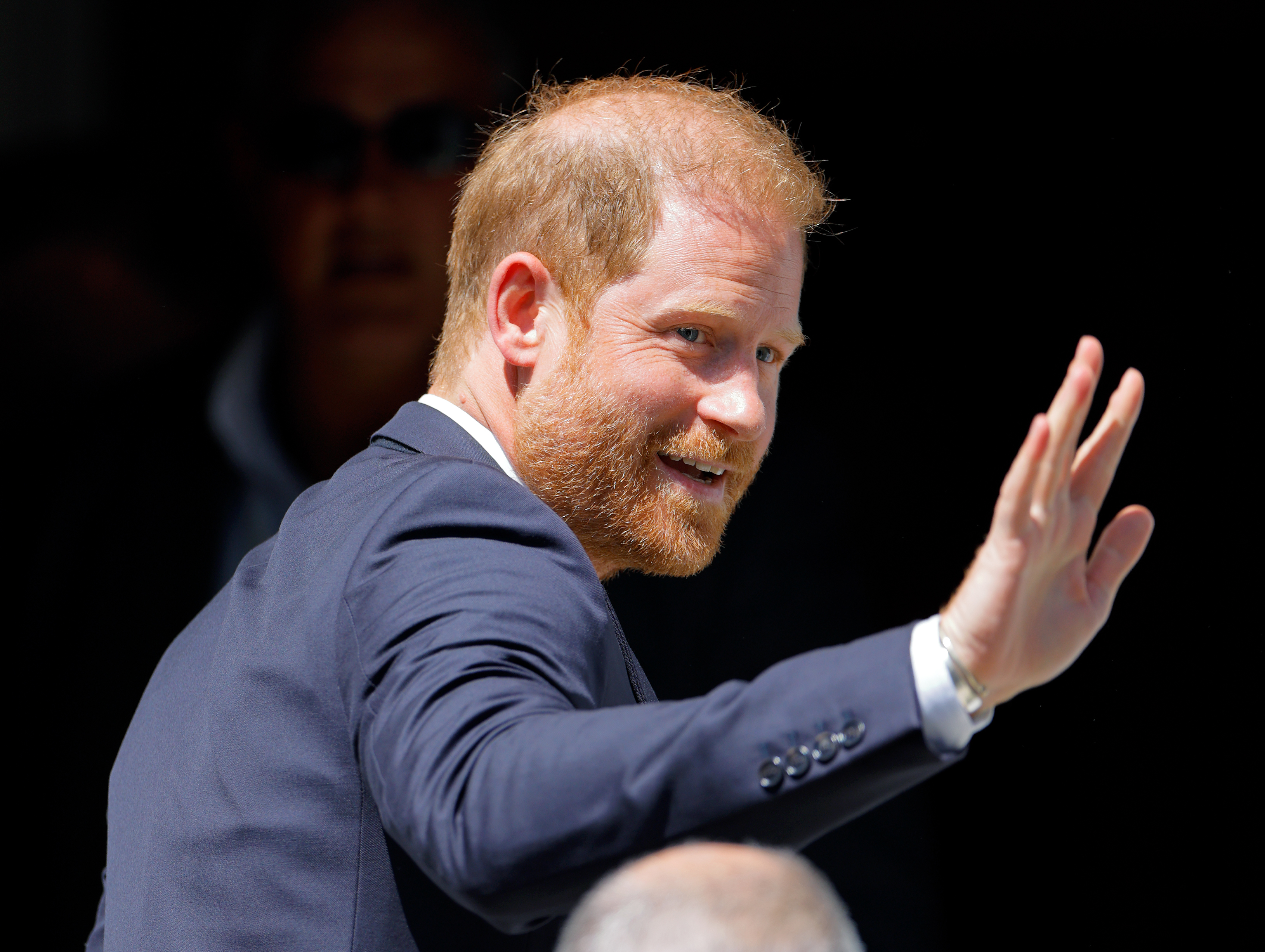 Prince Harry waves while attending an Invictus Games Foundation event in London on July 7, 2026. The appearance came about two months before his September visit to Tower Bridge Studios. | Source: Getty Images