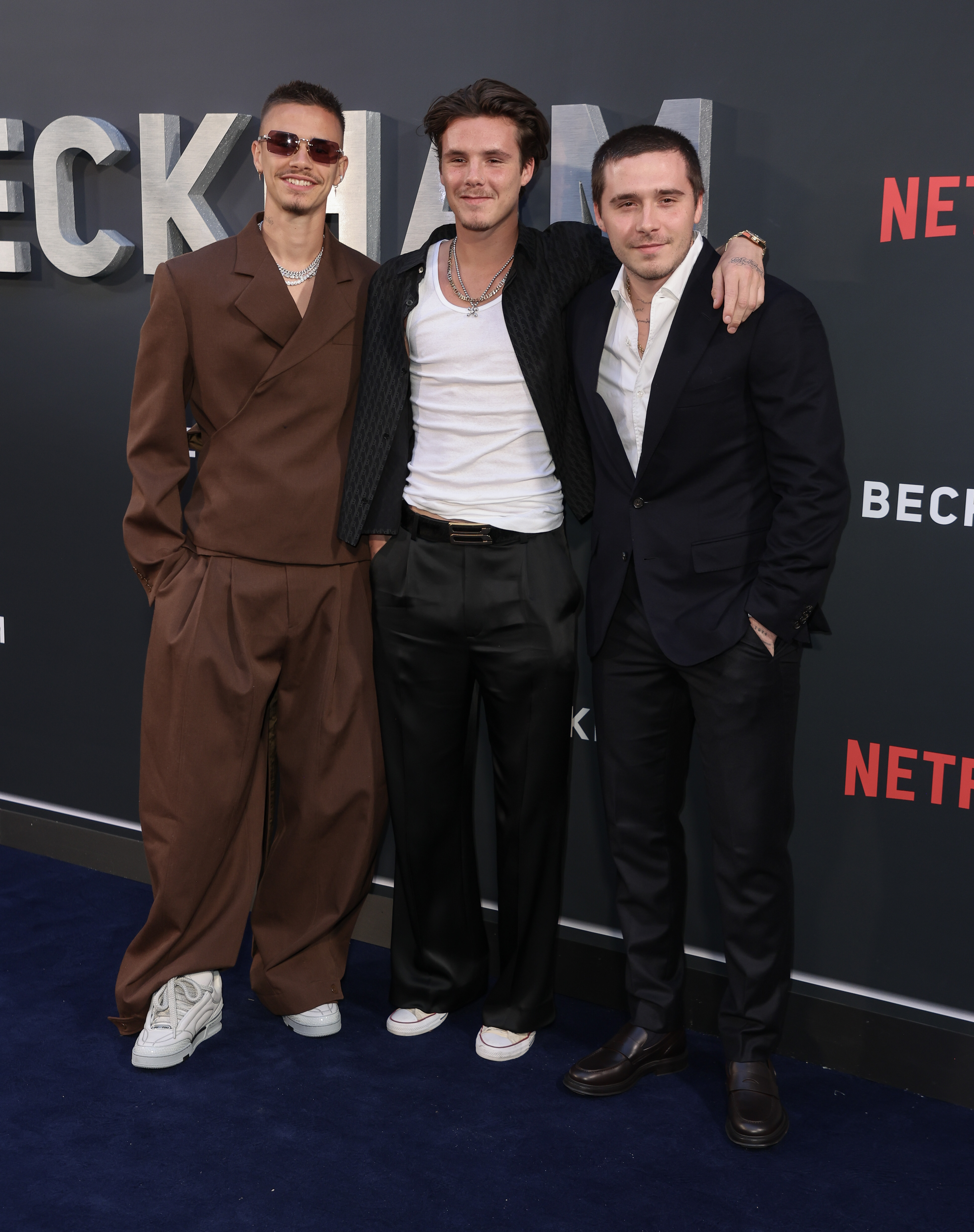 Romeo, Cruz, and Brooklyn Beckham attend the Netflix 'Beckham' UK Premiere at The Curzon Mayfair on October 3, 2023, in London, England. | Source: Getty Images