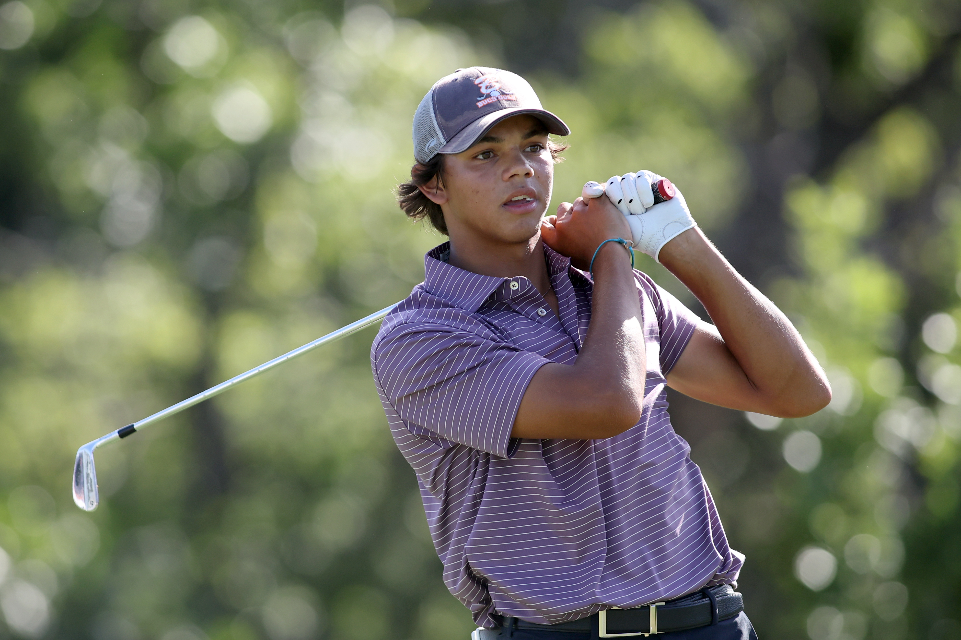 Charlie Woods hits a tee shot on the fourth hole during the first round of the U.S. Junior Amateur at Brook Hollow Golf Club on July 21, 2025, in Dallas, Texas | Source: Getty Images