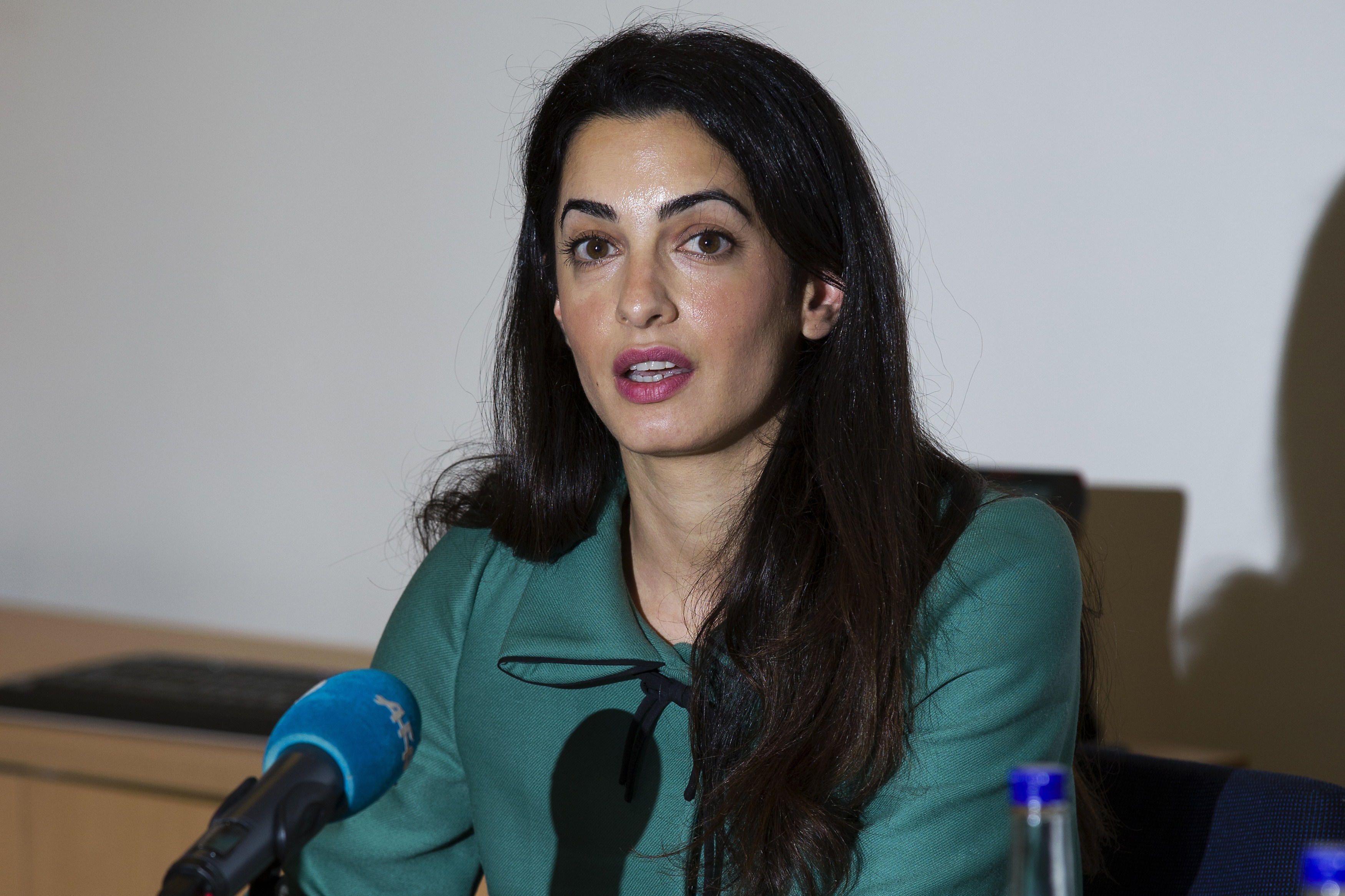 Amal Alamuddin speaks at a press conference in London on November 5, 2012. At the time, she was already recognized as a prominent international lawyer, long before her marriage to George Clooney placed her in the global spotlight.