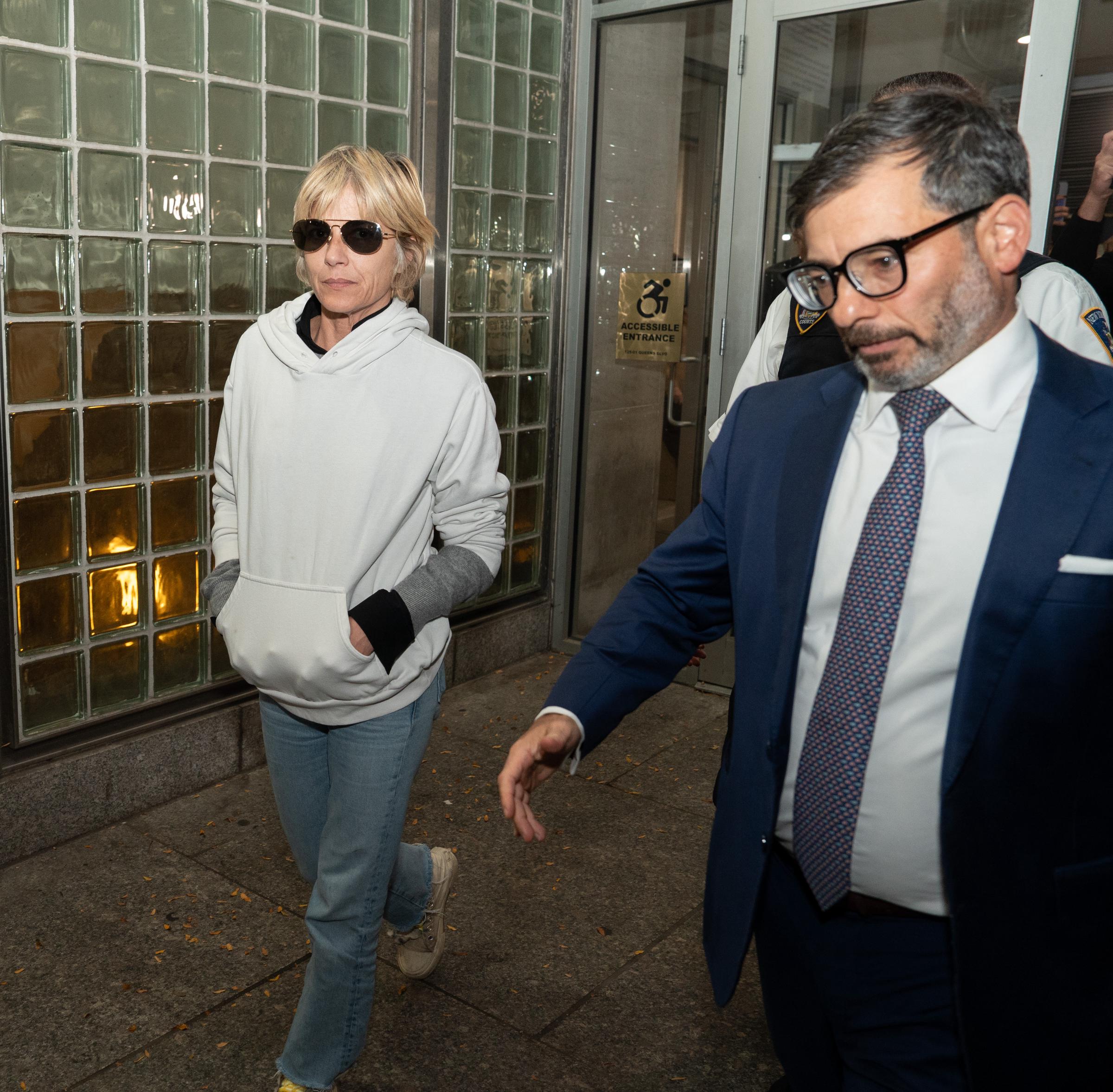 Selma Blair is photographed outside Queens Criminal Court in New York City on October 12, 2026, following her arraignment over assault allegations linked to a Delta Air Lines flight incident. The actress pleaded not guilty to two state assault charges and later posted bail. | Source: Getty Images