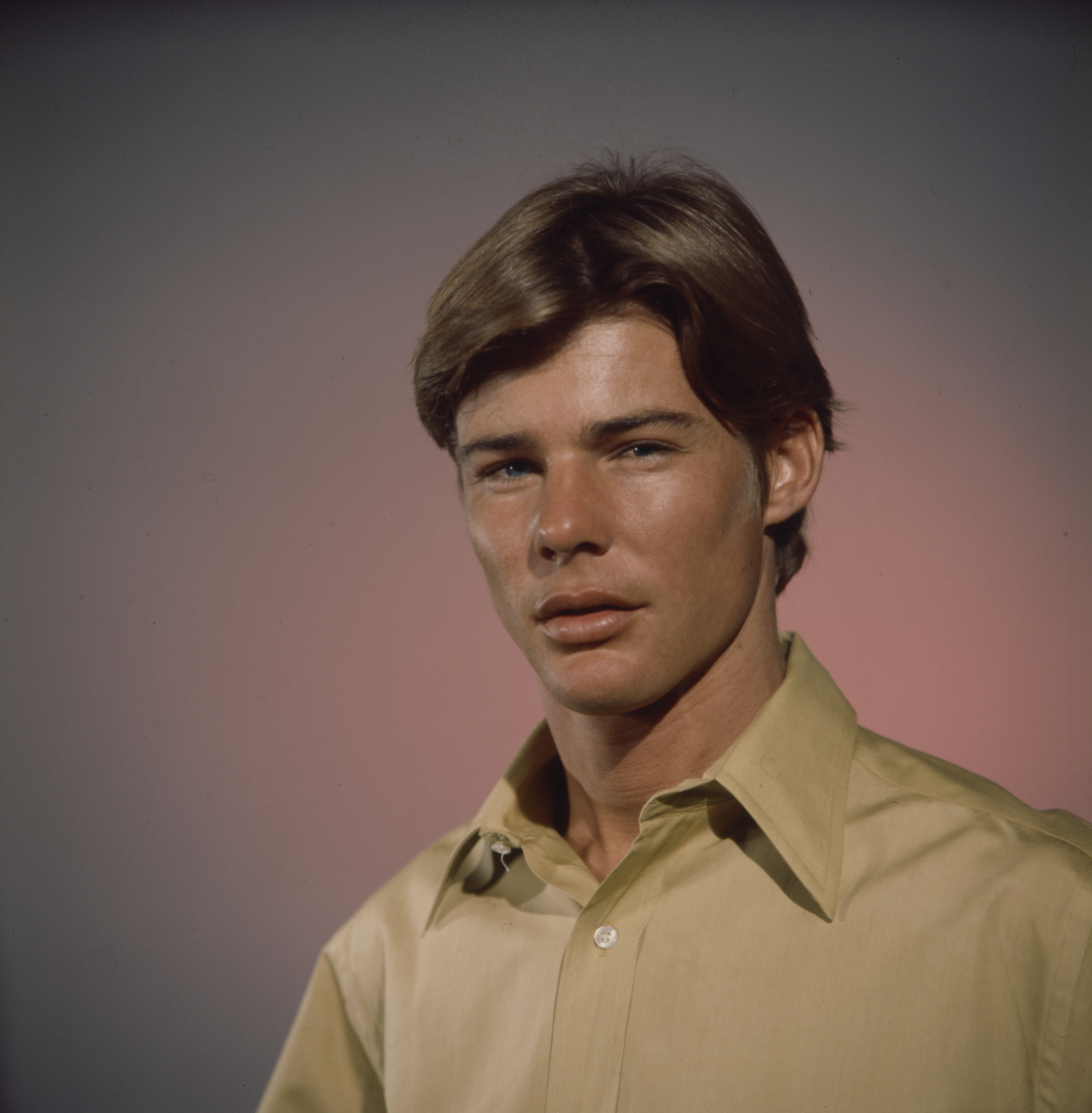 Jan-Michael Vincent posing for a promotional photo for the Walt Disney television series "The Survivors" in 1969. | Source: Getty Images