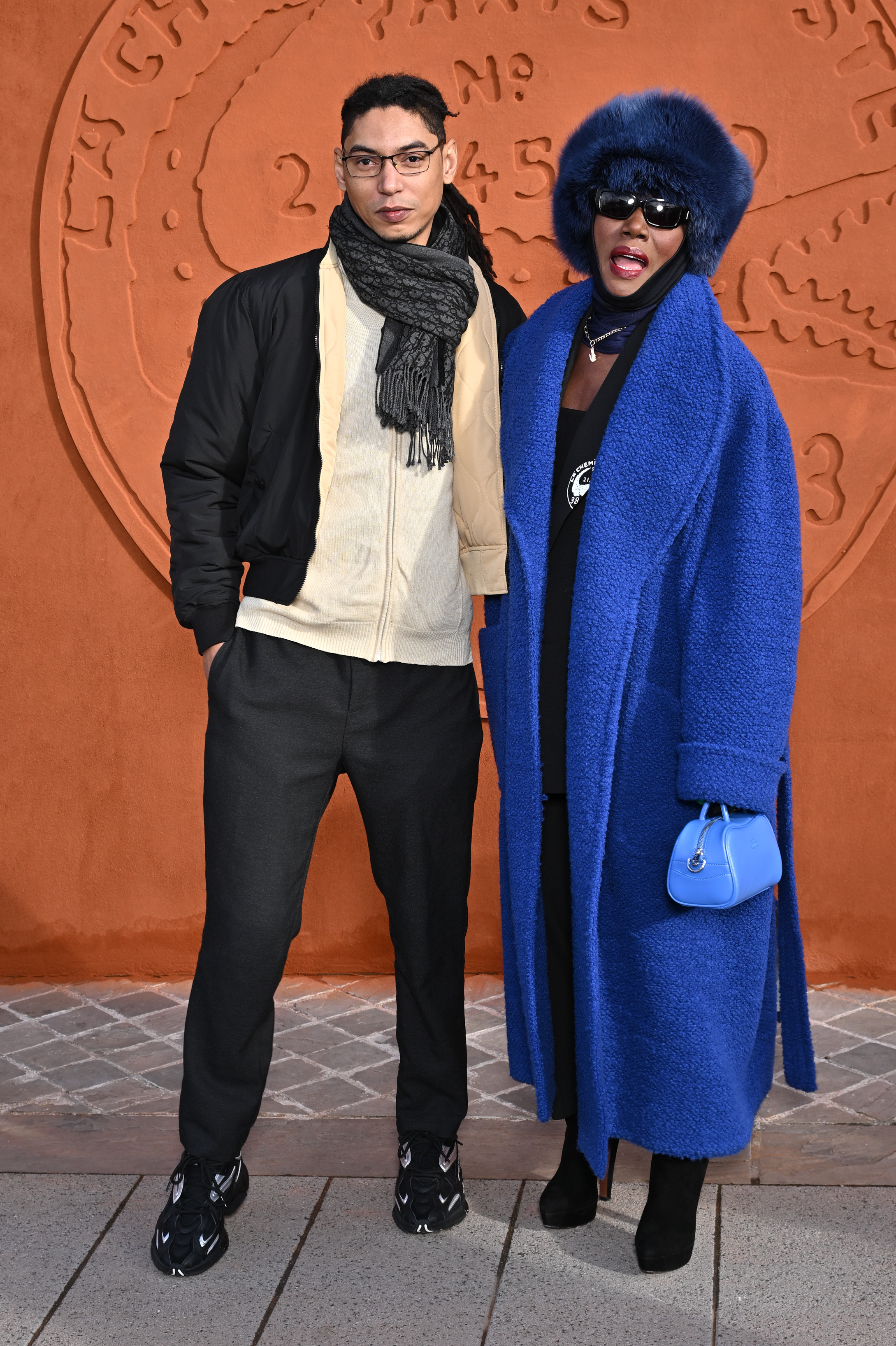 Paulo Goude and his mom, Grace Jones, at the Lacoste Womenswear Fall/Winter 2024-2025 show as part of Paris Fashion Week in France on March 5, 2024. | Source: Getty Images