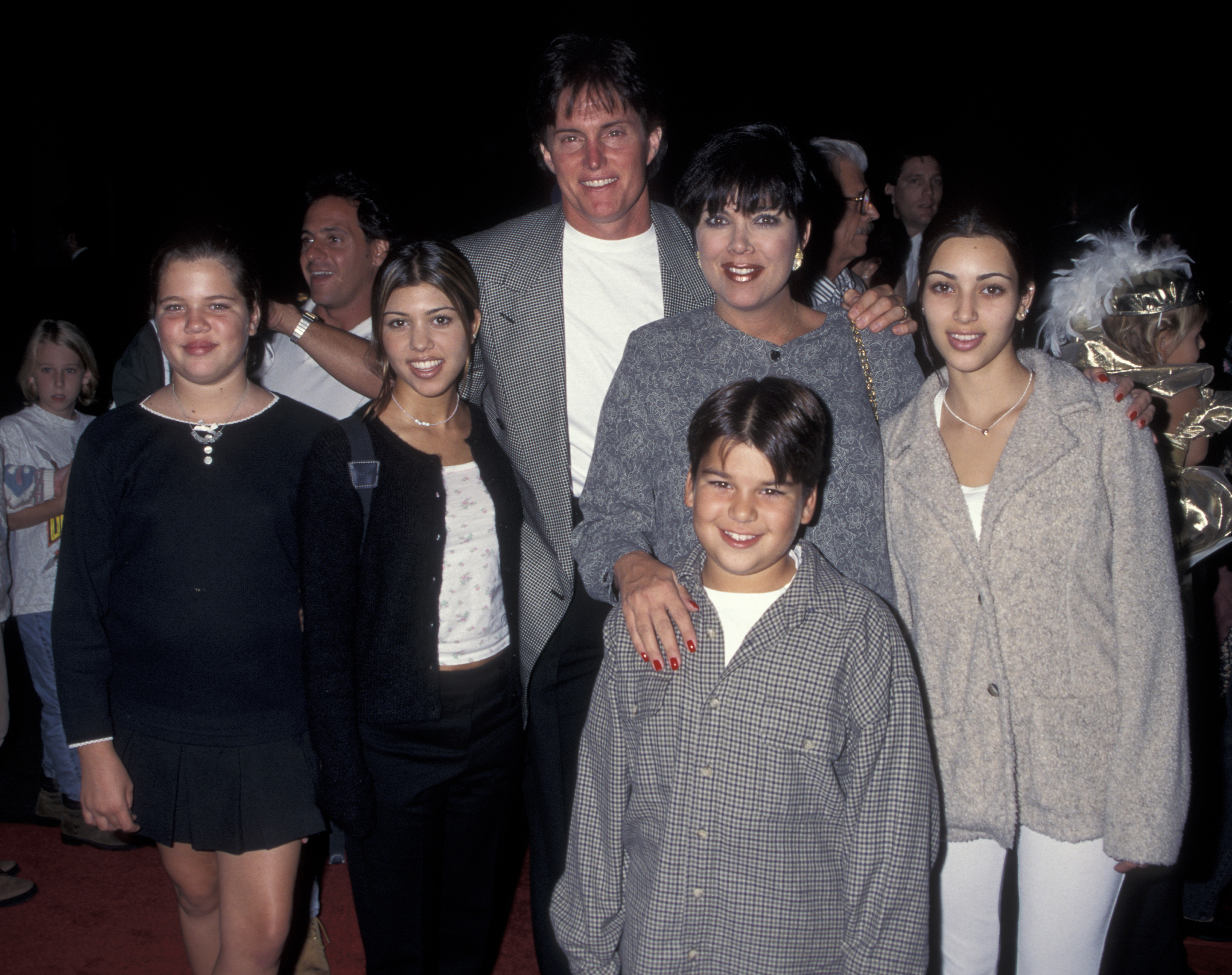 Kris Jenner poses with her family at the Cinderella video release, pictured alongside Bruce Jenner and her children Khloé, Kourtney and Kim Kardashian, as well as Robert Kardashian. | Source: Getty Images