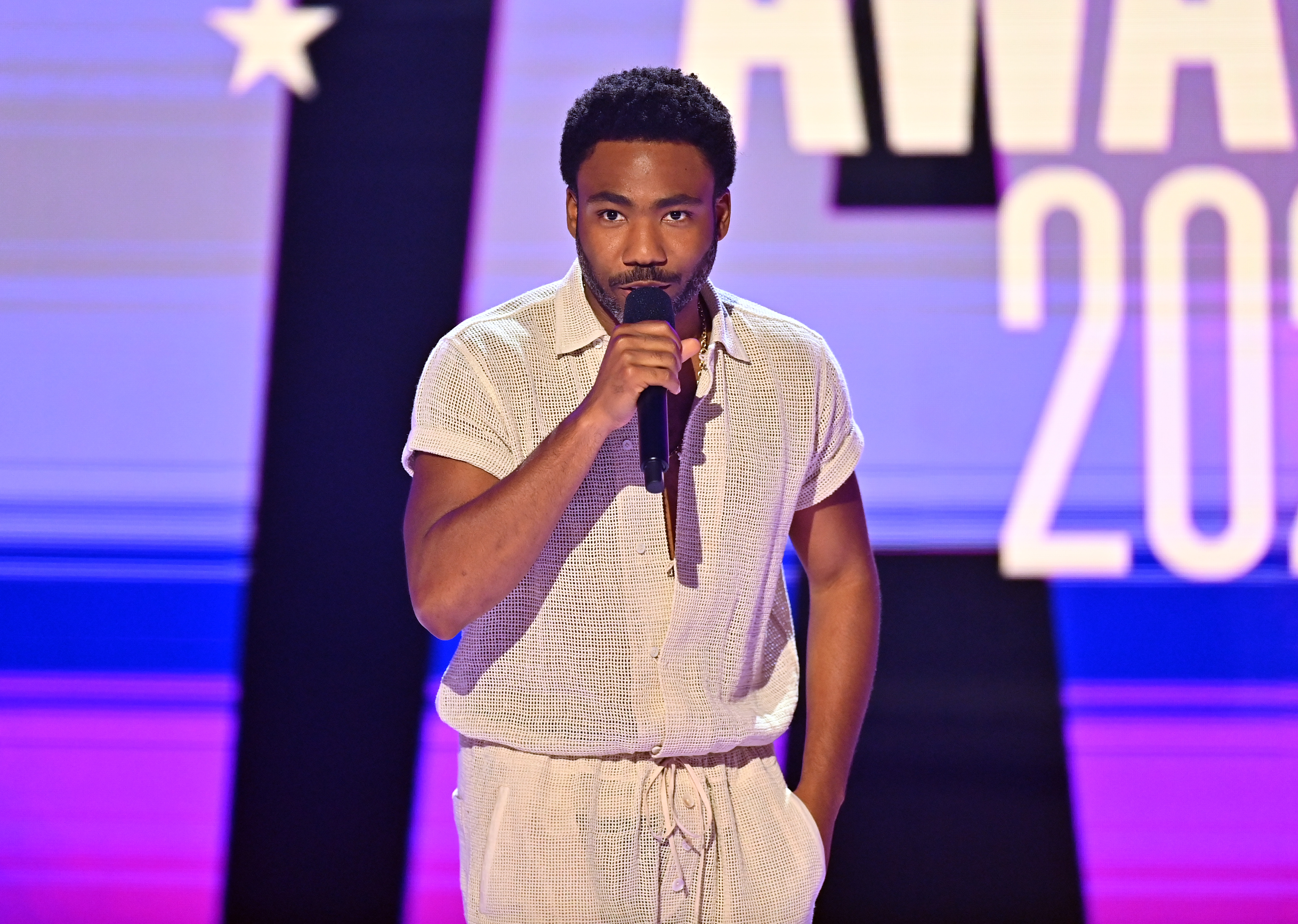 Donald Glover speaks onstage at the BET Awards in Los Angeles, California, on June 30, 2024 | Source: Getty Images