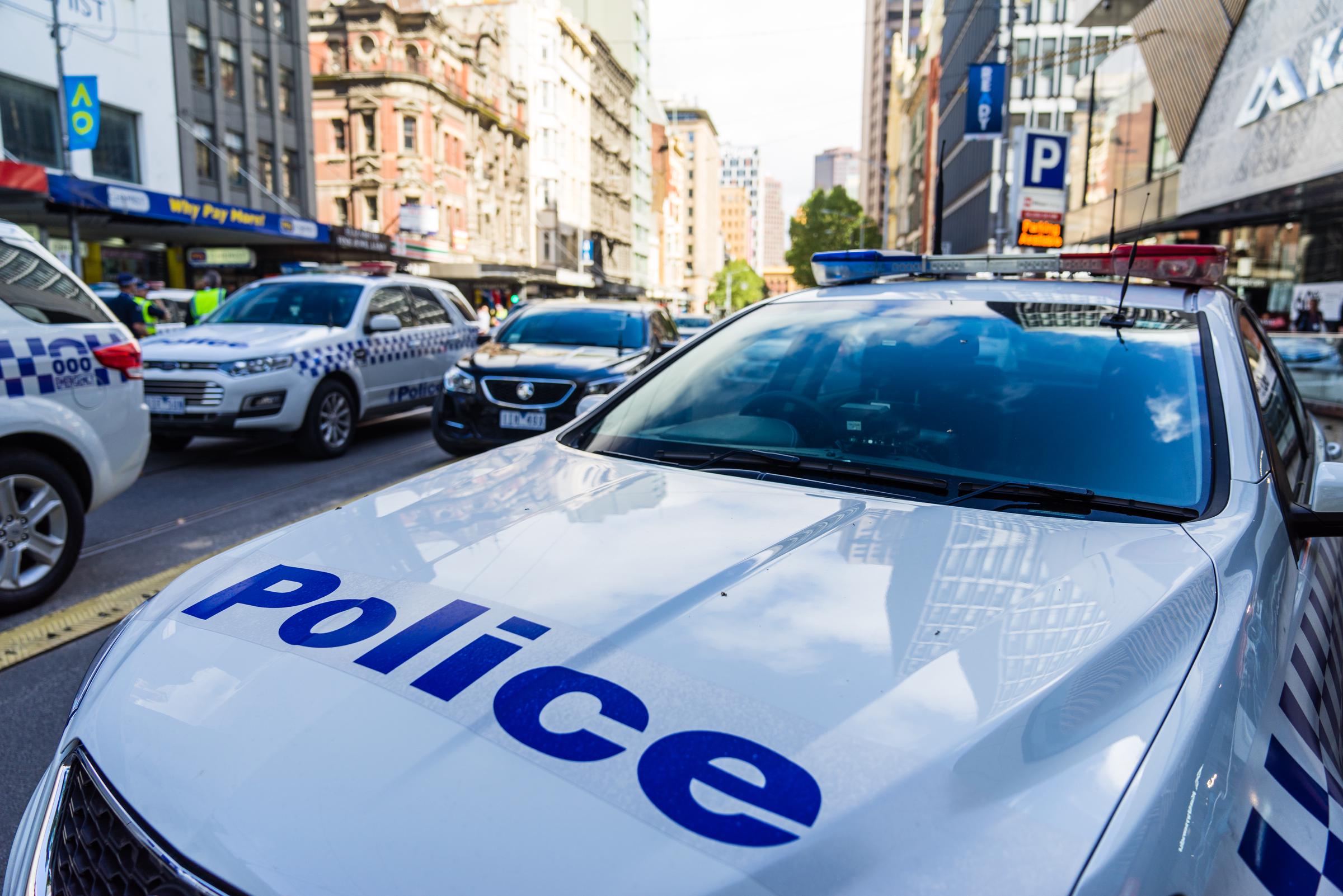Police and Emergency services attend to a crime scene. | Source: Getty Images