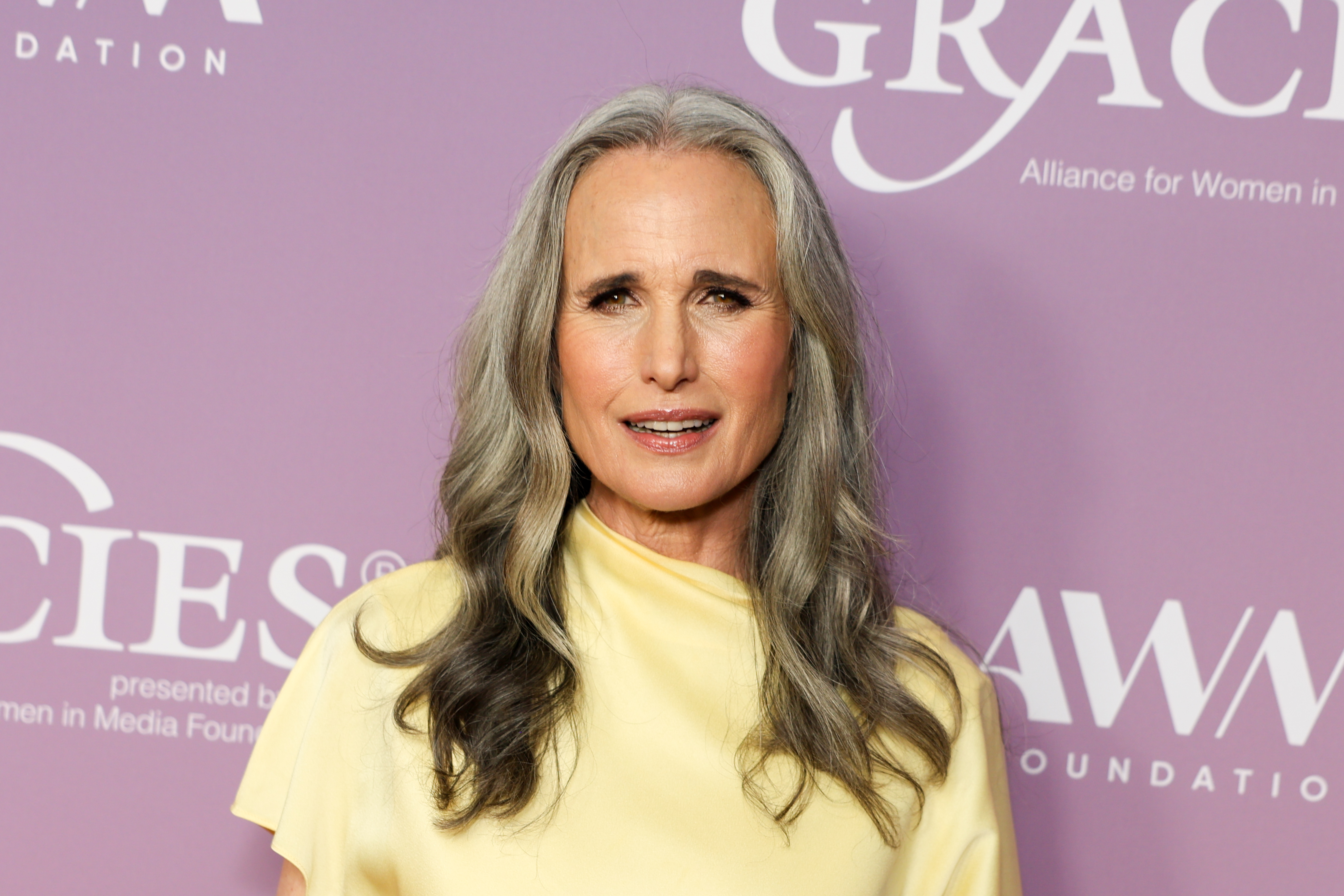 Andie MacDowell's naturally silver hair has become one of her signature features, a look she embraced with encouragement from her children despite early doubts from her managers. | Source: Getty Images