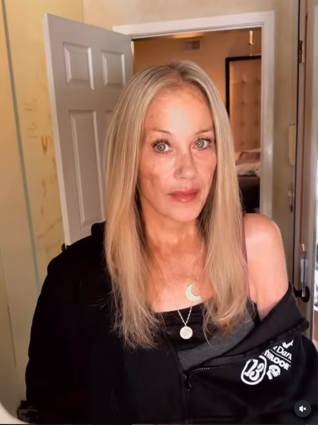 Christina Applegate debuted fresh blonde hair and a noticeably different look in her September 21 Instagram video, giving fans their first extended glimpse of her since returning home from the hospital. She kept things casual in a black outfit and layered necklaces while smiling at the camera. | Source: Instagram/christinaapplegate