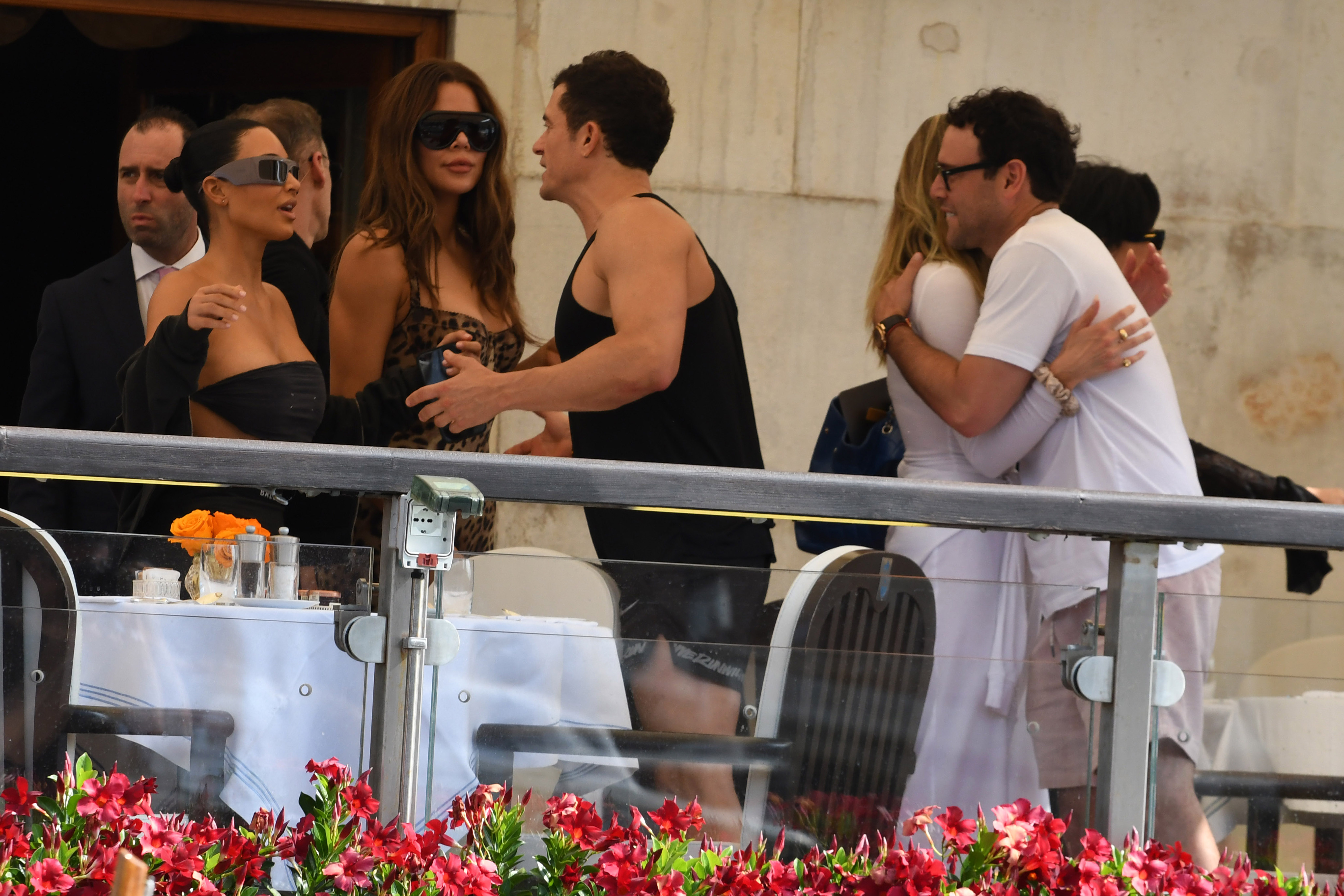 Kim Kardashian, Khloé Kardashian, and Orlando Bloom ahead of Jeff Bezos and Lauren Sanchez's wedding on June 26, 2025 in Venice, Italy. (Photo by Luigi Iorio/GC Images)meet ahead of Jeff Bezos and Lauren Sanchez Wedding on June 26, 2025 in Venice, Italy | Source: Getty Images