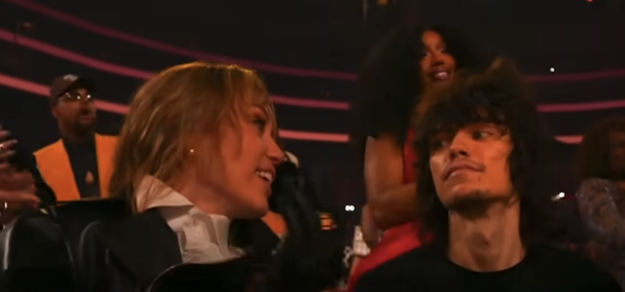 Miley Cyrus and friend react to Lady Gaga winning Best Pop Vocal Album for "MAYHEM" during the 68th Annual Grammy Awards at Crypto.com Arena on February 1, 2026, in Los Angeles | Source: YouTube/Page Six