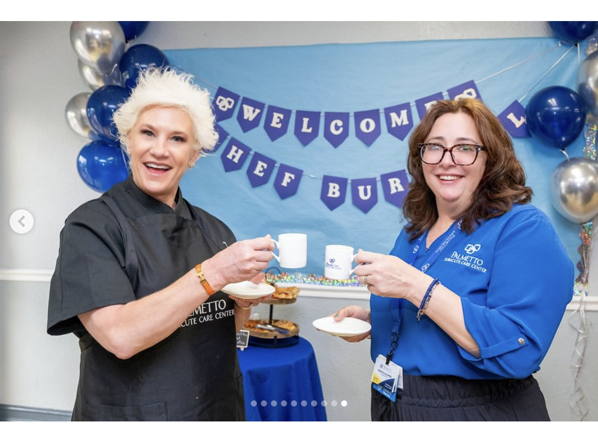 Anne Burrell is seen in a candid shot with a CareRite Center staff member, dated June 11, 2025 | Source: Instagram/careritecenters