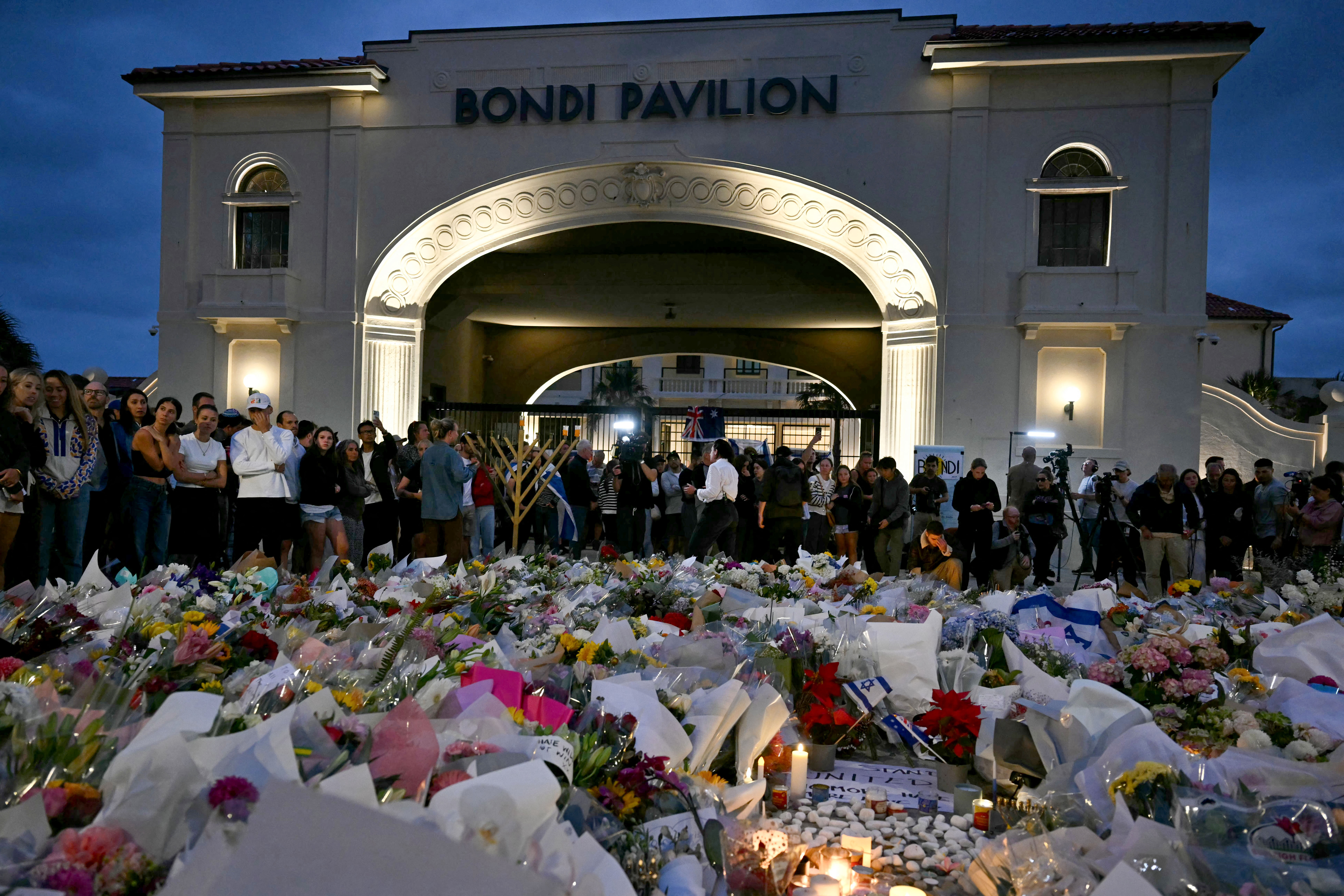 Mourners gather at a tribute at the Bondi Pavilion in memory of the victims of a shooting at Bondi Beach on December 15, 2025, in Sydney, Australia | Source: Getty Images