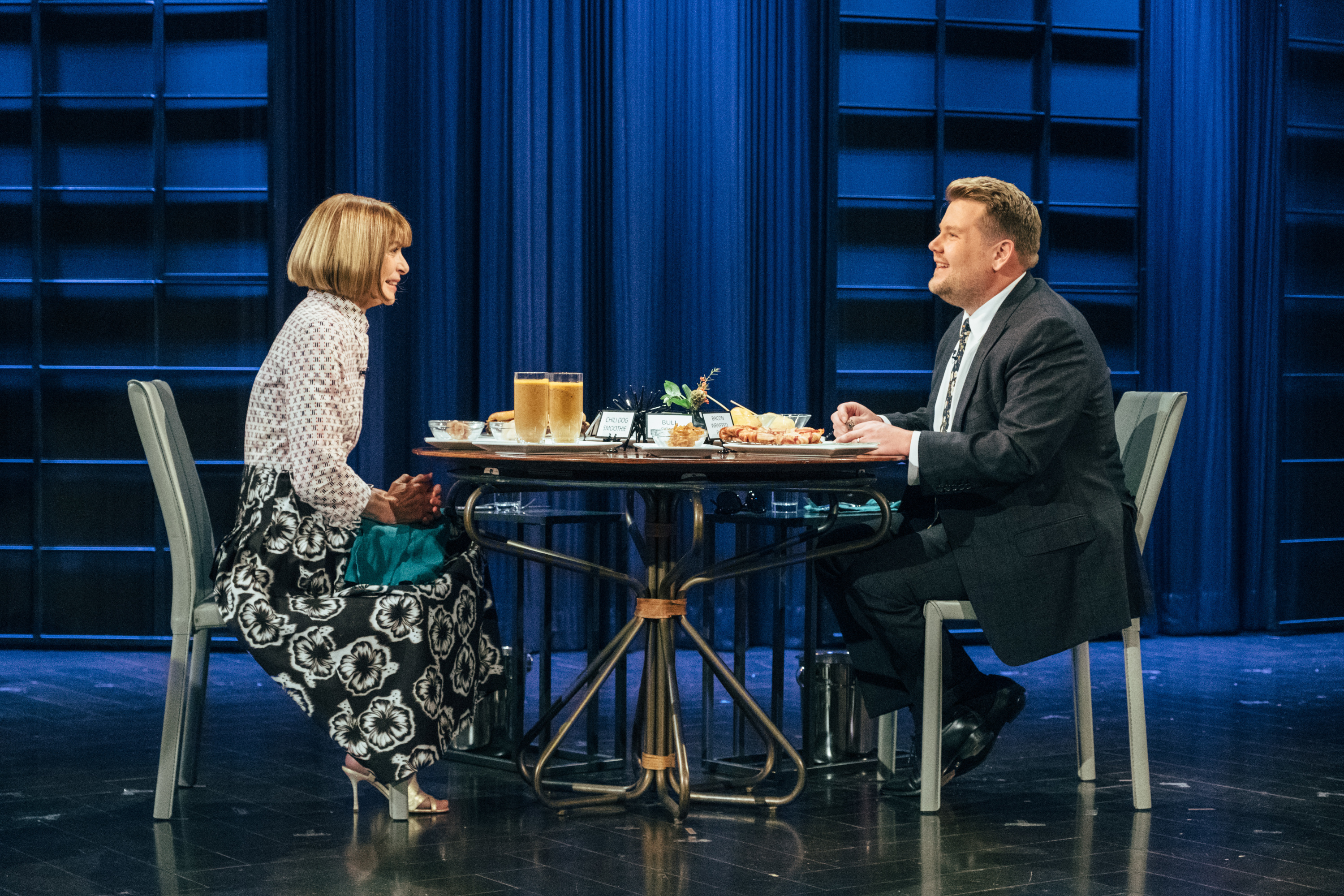 Anna Wintour plays "Spill Your Guts or Fill Your Guts" with James Corden during "The Late Late Show with James Corden," on October 25, 2017 | Source: Getty Images