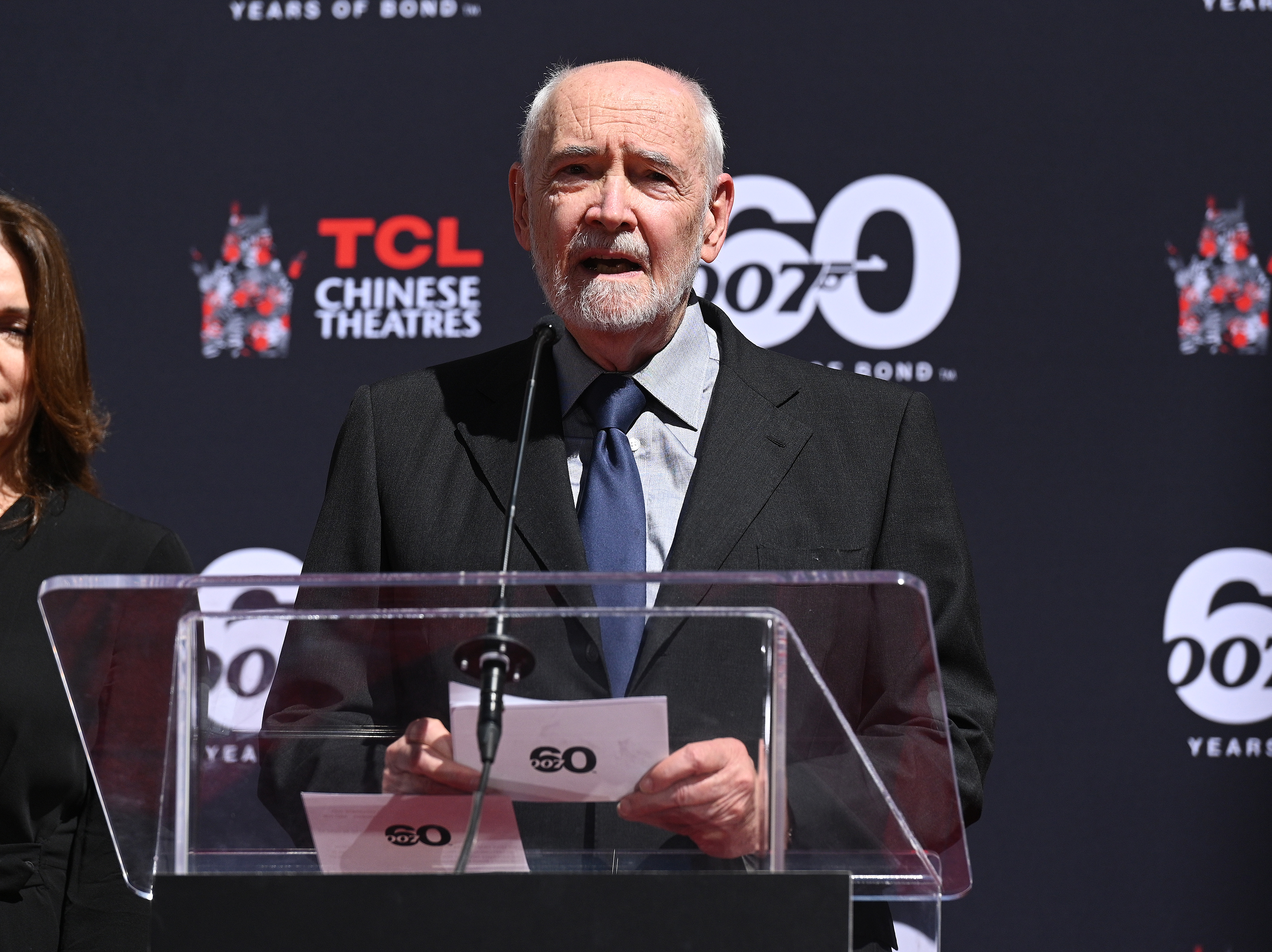 The longtime James Bond producer speaks during the Hand and Footprint Ceremony marking the franchise's 60th anniversary at the TCL Chinese Theatre in Los Angeles, California, on September 21, 2022. | Source: Getty Images