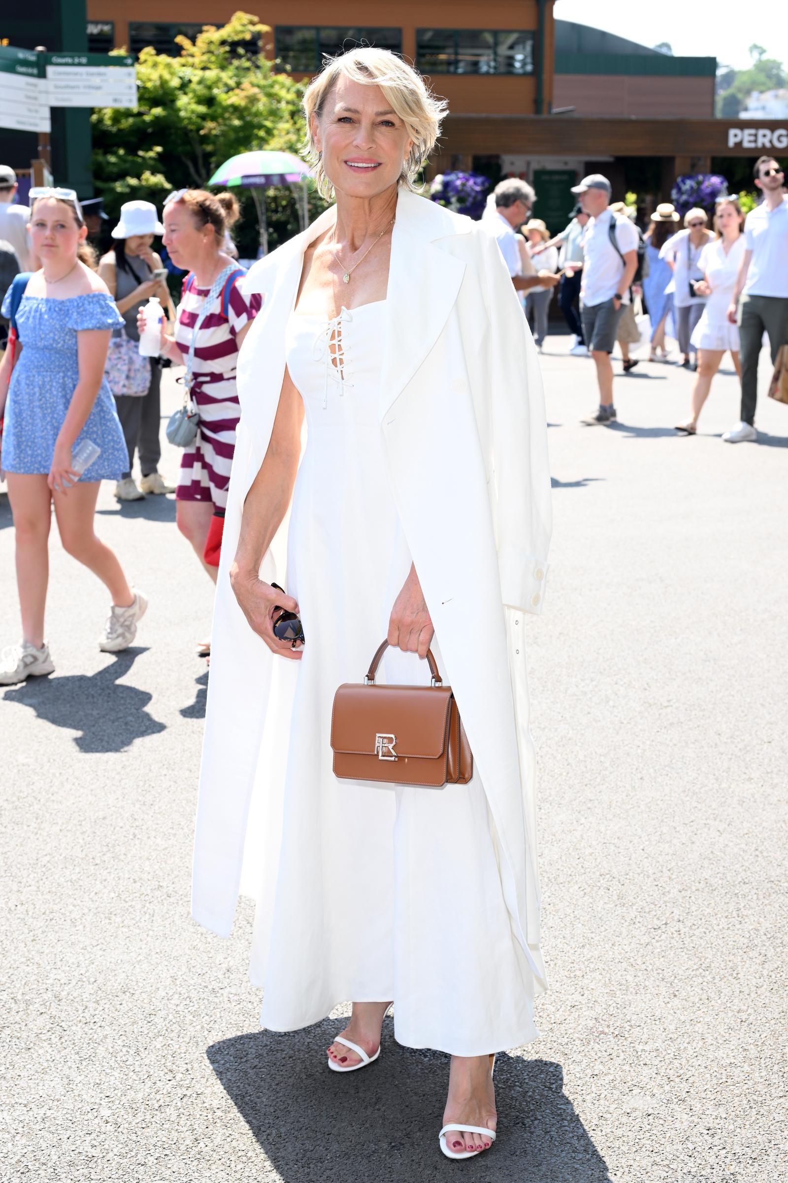 Robin Wright has continued spending much of her time in England while balancing work on both sides of the Atlantic. She says the slower pace and everyday way of life there are what keep drawing her back. | Source: Getty Images