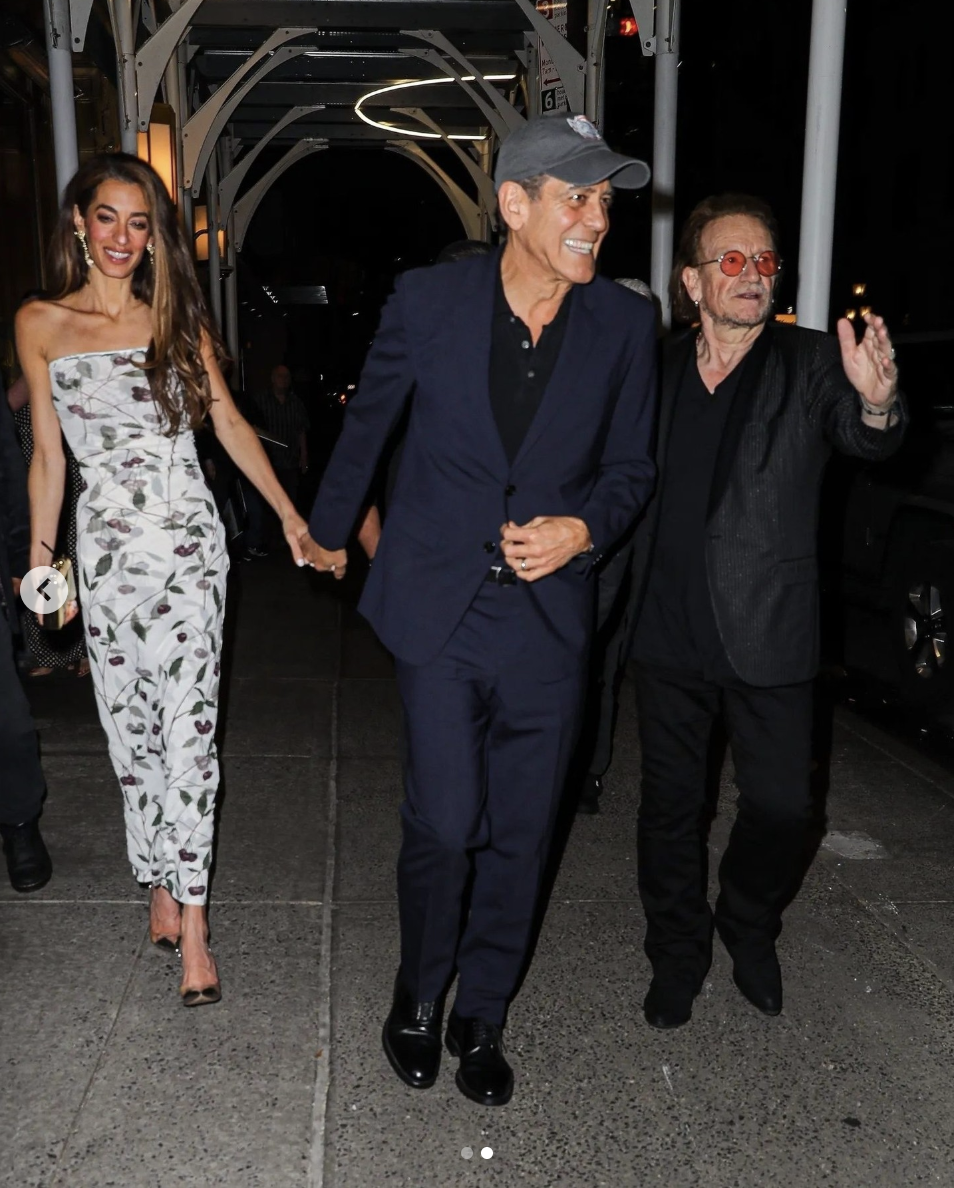 Amal and George Clooney out with Bono in Midtown Manhattan posted on June 1, 2025. | Source: Instagram/voguemagazine