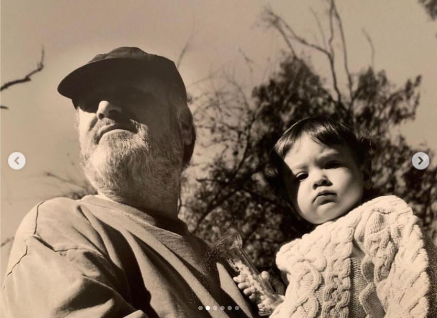 A photo shows Rob Reiner holding a younger Romy outdoors, from a post dated March 6, 2022. | Source: Instagram/romyreiner