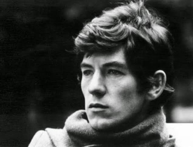 An archival black-and-white portrait captures a young actor in his early years. Patrick Stewart later credited his passion for Shakespeare with helping him escape a troubled childhood, eventually building a celebrated career in classical theater. | Source: CelebStory