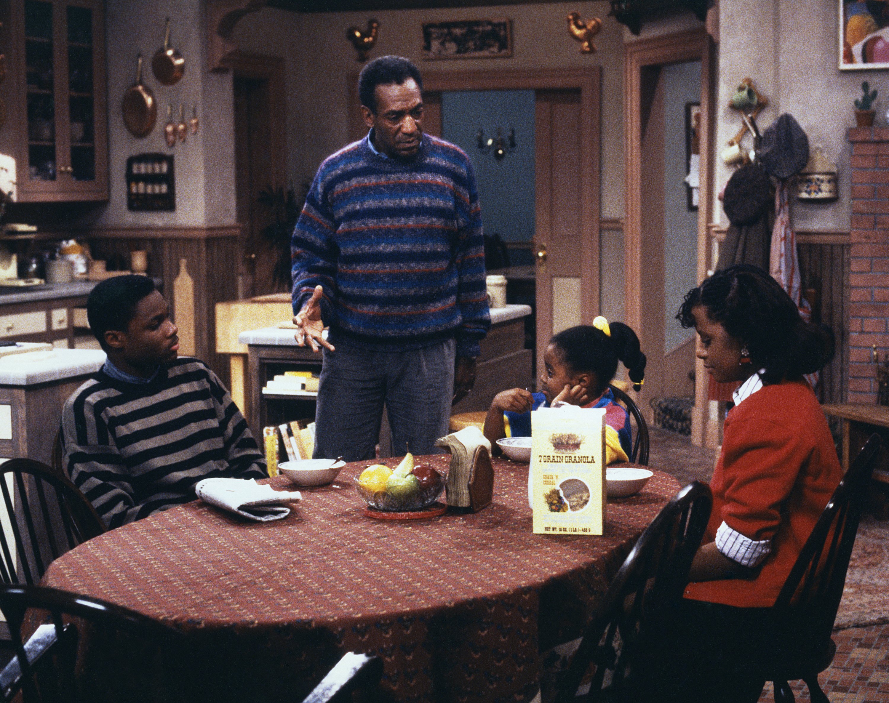 Still image from episode 10 of "The Cosby Show," featuring Malcolm-Jamal Warner, Bill Cosby, Keshia Knight Pullman, and Tempestt Bledsoe, c. 1985. | Source: Getty Images