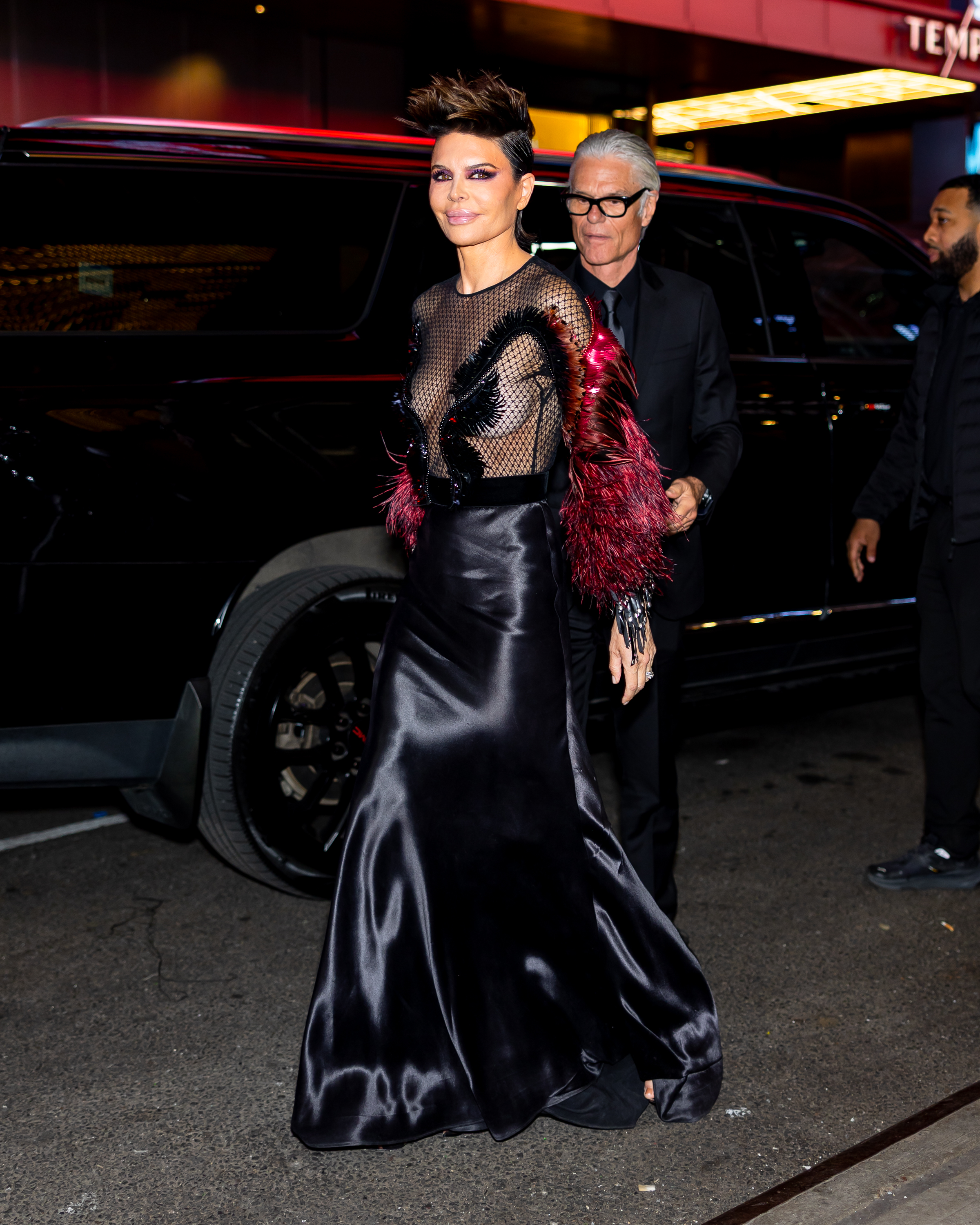 Lisa Rinna and Harry Hamlin making their way to the event. | Source: Getty Images