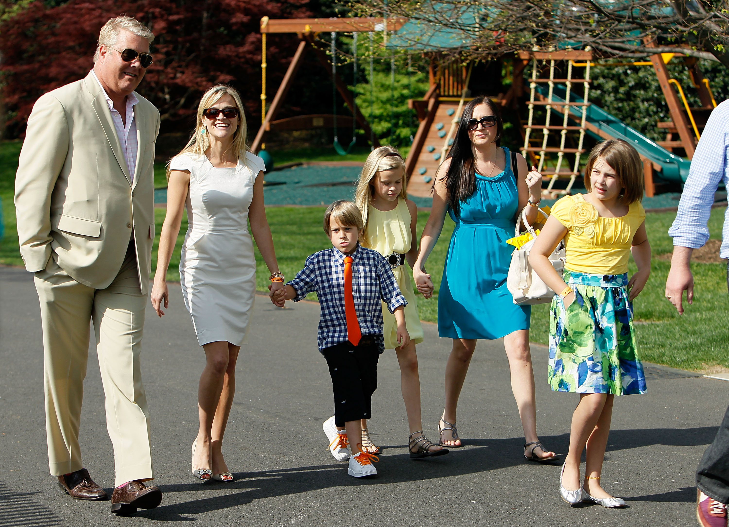 Reese Witherspoon walks across the South Lawn with Deacon Reese Phillippe, Ava Elizabeth Phillippe, and others at the White House Easter Egg Roll, a tradition dating back to 1878. | Source: Getty Images