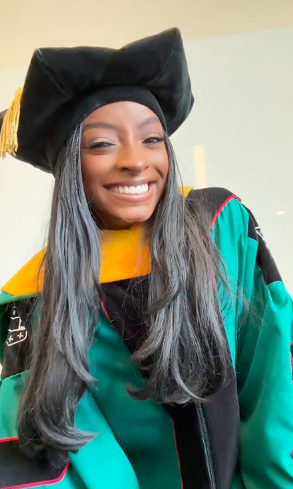 Simone Biles acting along to an audio clip about her degree, posted on May 12, 2025. | Source: TikTok/@simonebilesowens
