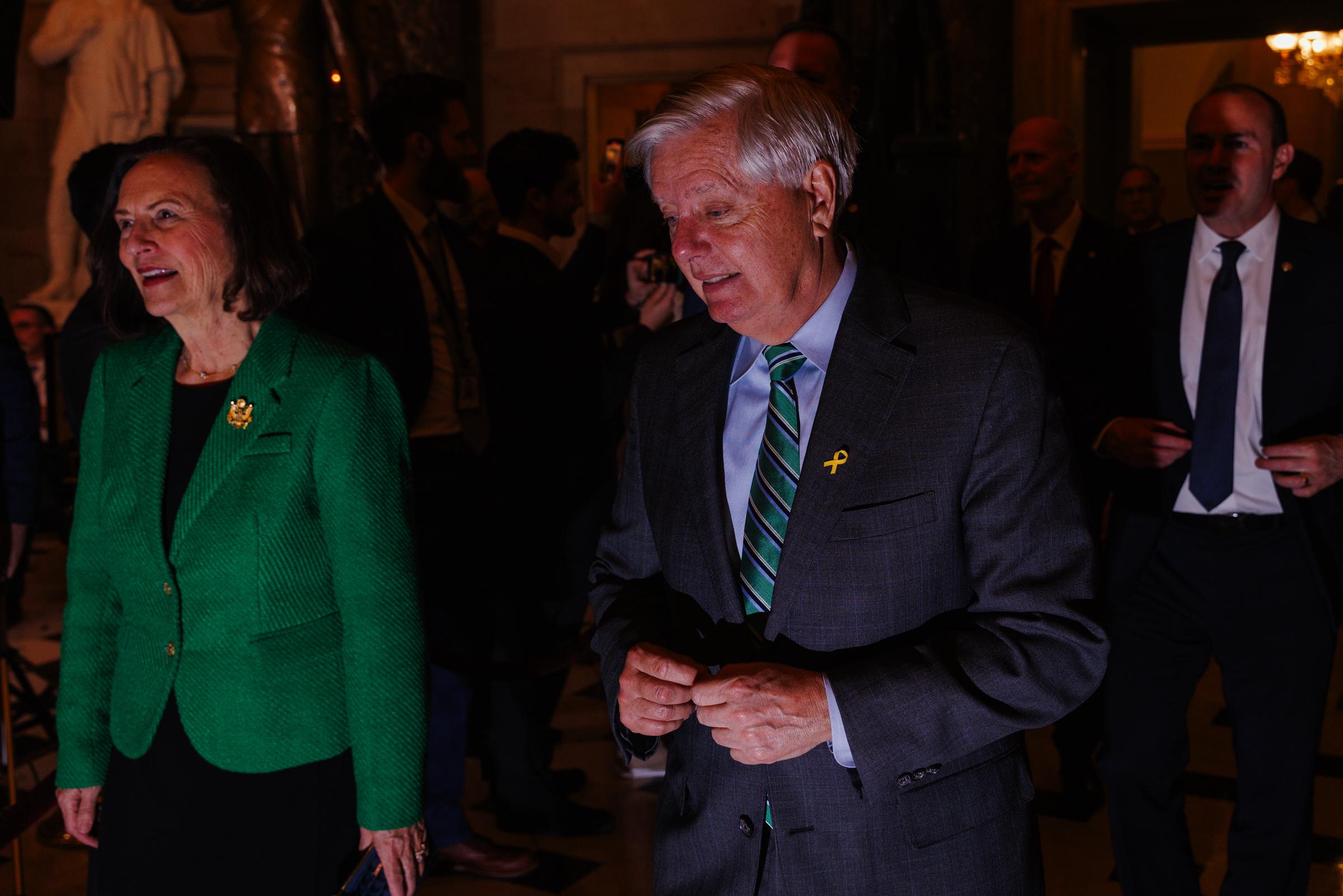 Lindsey Graham walks through the Capitol on his way to the House chamber before the President's State of the Union address, joining fellow lawmakers for one of Washington's most closely watched annual events. | Source: Getty Images