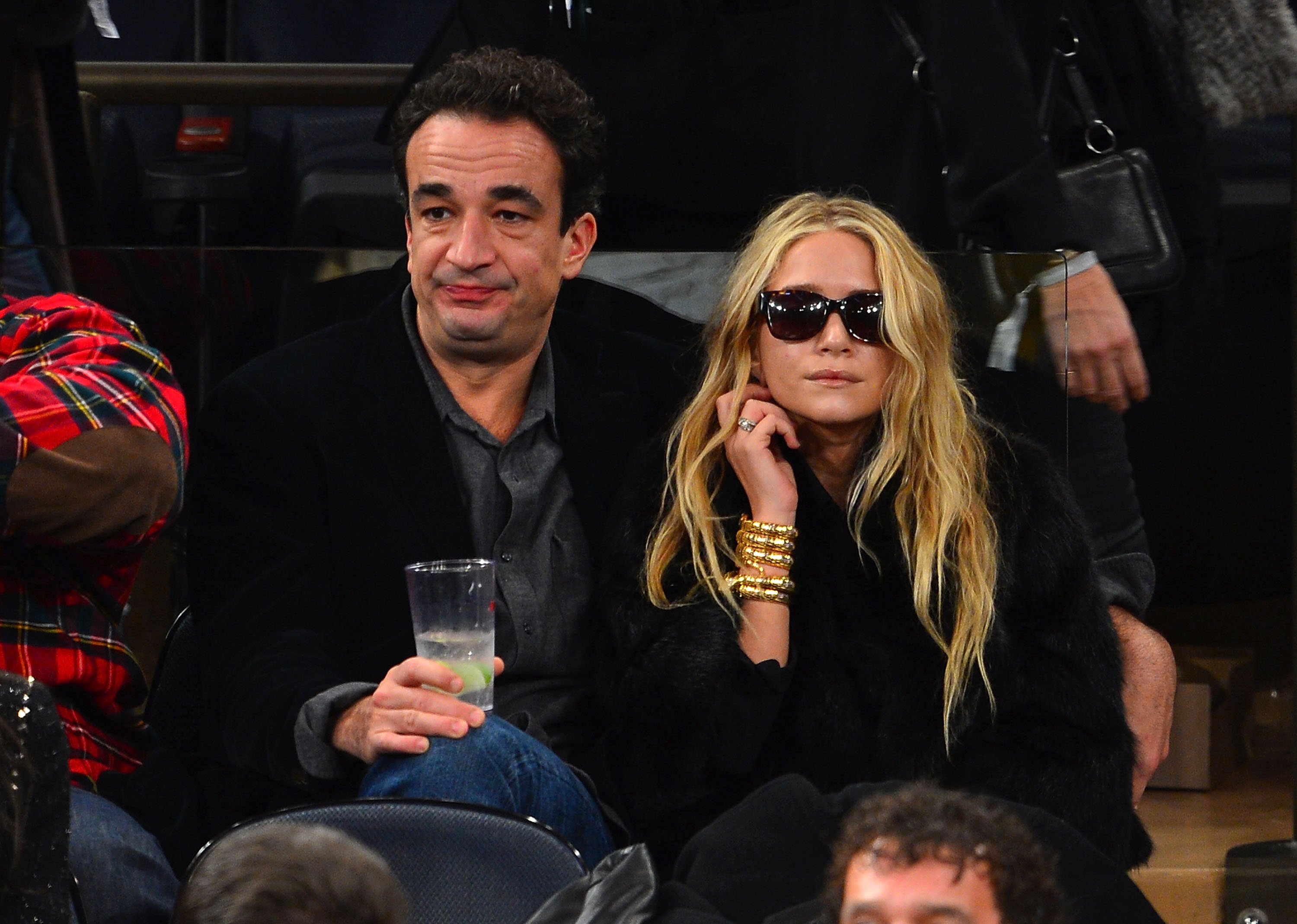 Olivier Sarkozy and the actress during the Cleveland Cavaliers vs New York Knicks game at Madison Square Garden on December 15, 2012 | Source: Getty Images