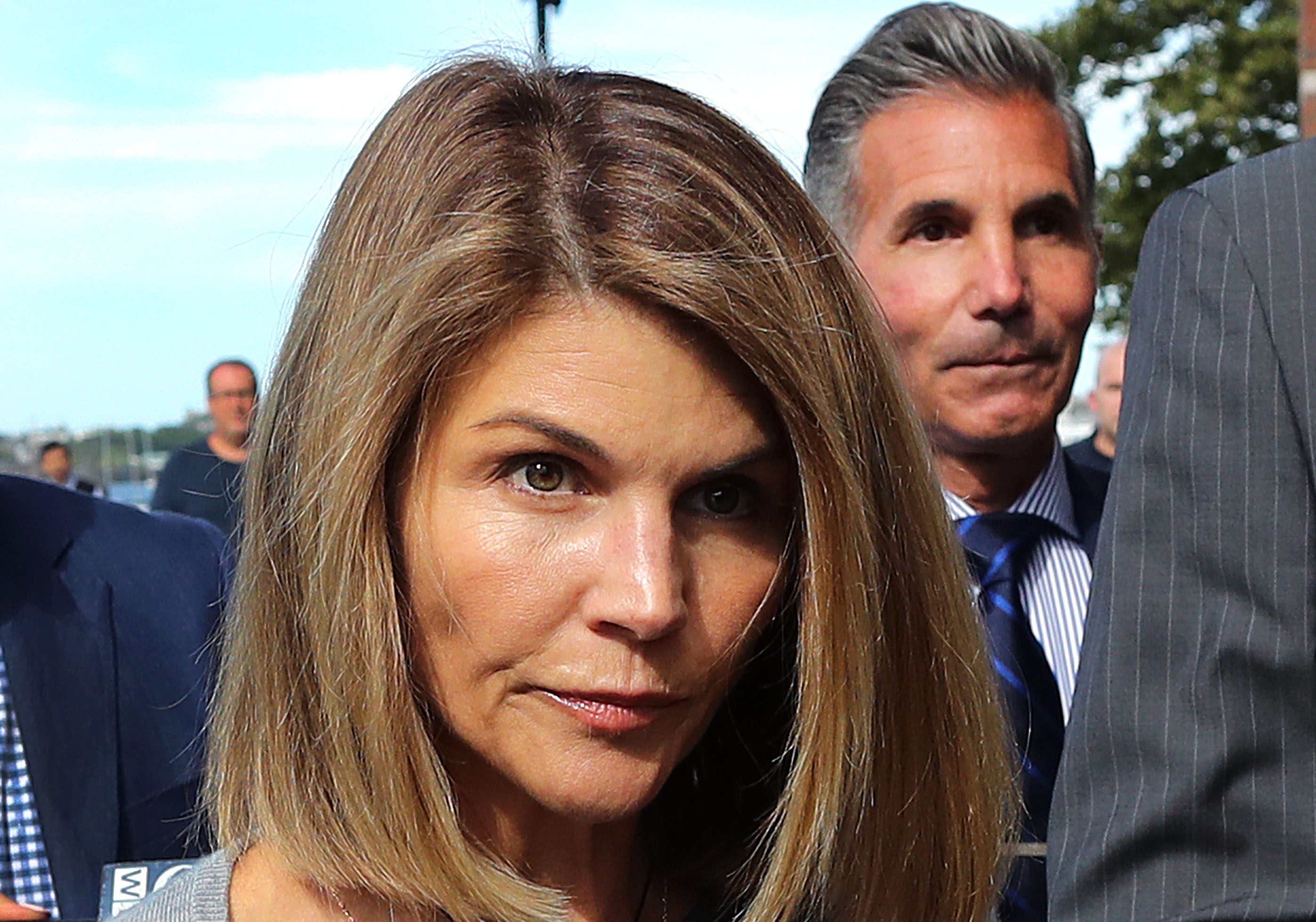 Lori Loughlin disappeared from Instagram seven years ago amid mounting legal scrutiny surrounding her family. In this photo, she and Mossimo Giannulli attended a hearing at John Joseph Moakley United States Courthouse on August 27, 2019, in Boston, Massachusetts. | Source: Getty Images