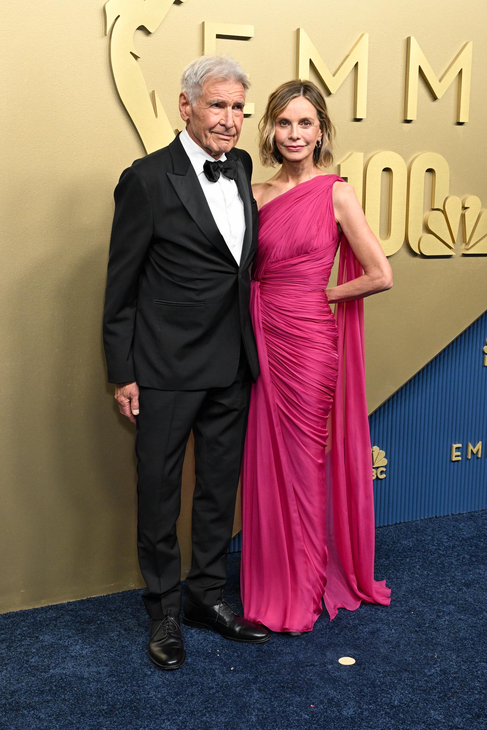 Ford and Flockhart pose side by side against the Emmys backdrop. The actor was among seven nominees for Outstanding Supporting Actor in a Comedy Series, an award that ultimately went to Stephen Root for "Widow's Bay."