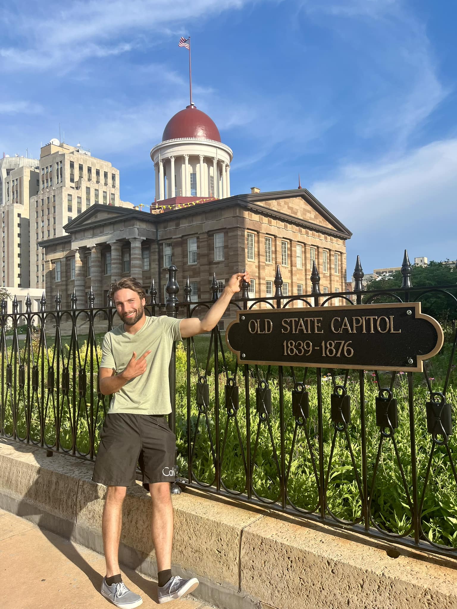 Xander Kazanowski posting next to the Old State Capitol in Springfield, Illinois, in a picture shared on June 25, 2025 | Source: Facebook/Xander Kazanowski